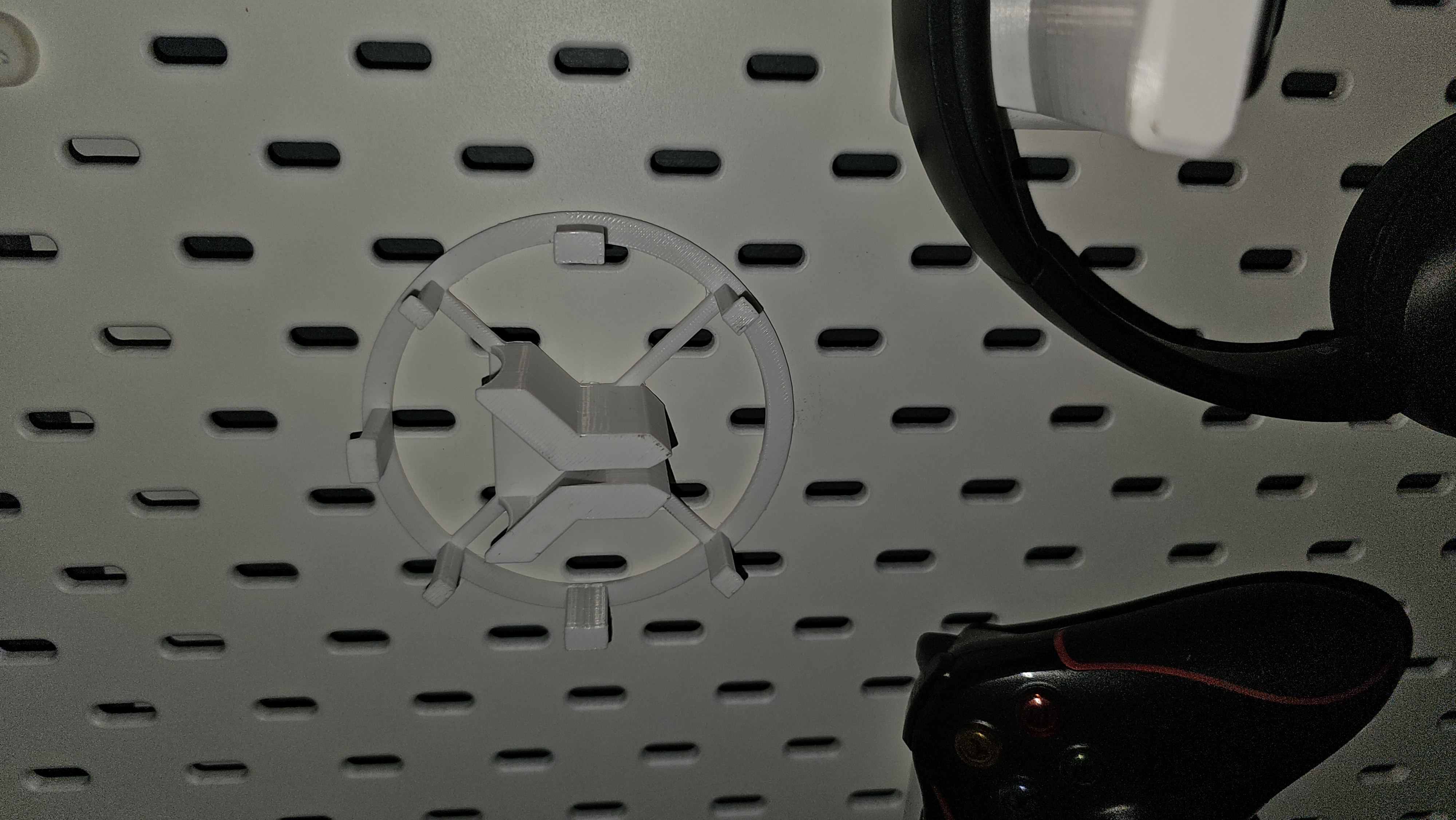 Iem holder for pegboard