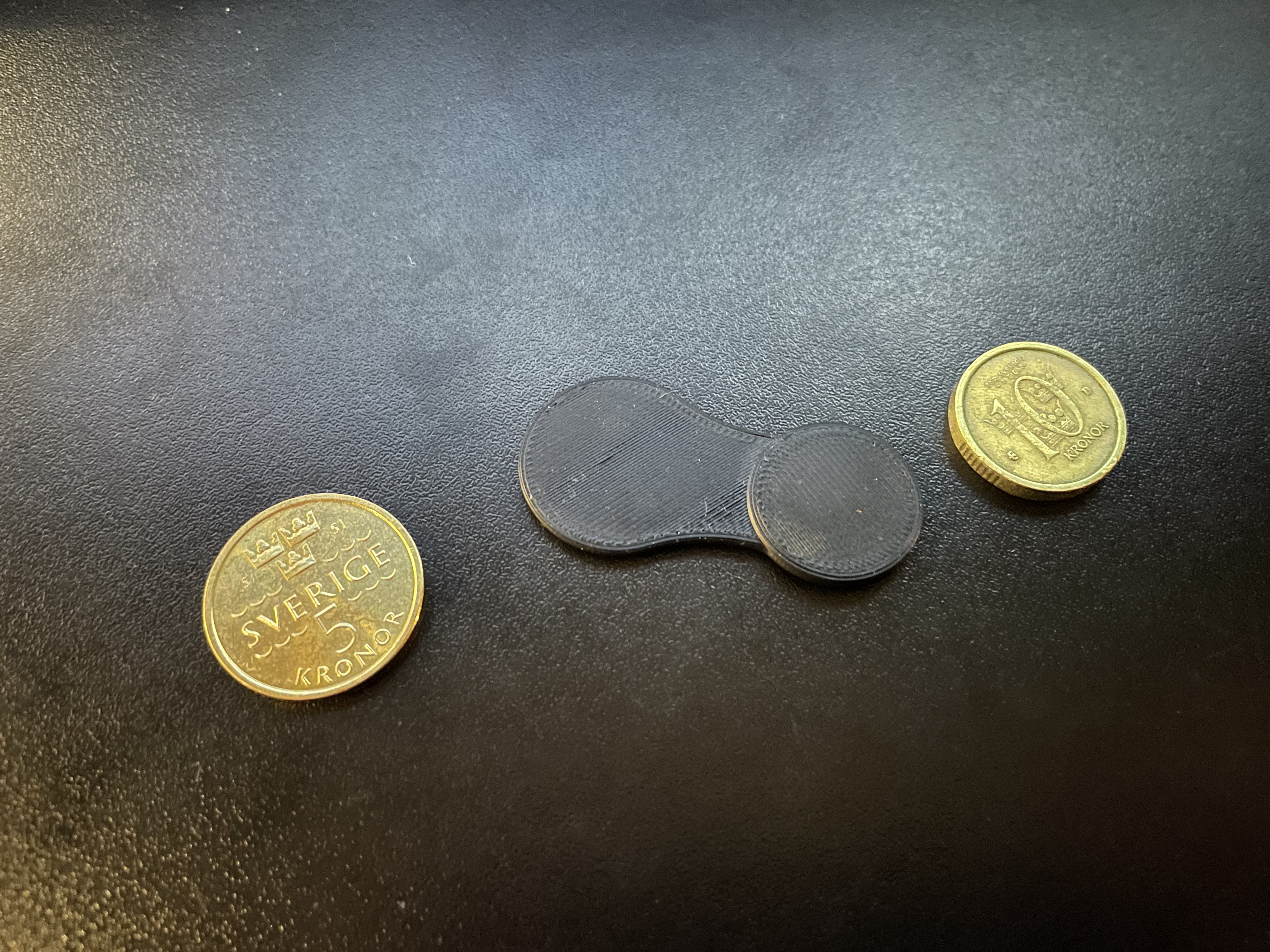 Femtian shopping trolley token.