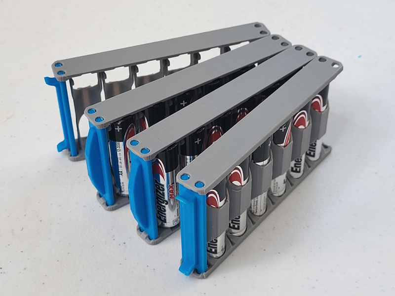 Unibody AA Battery Caps Book-binding
