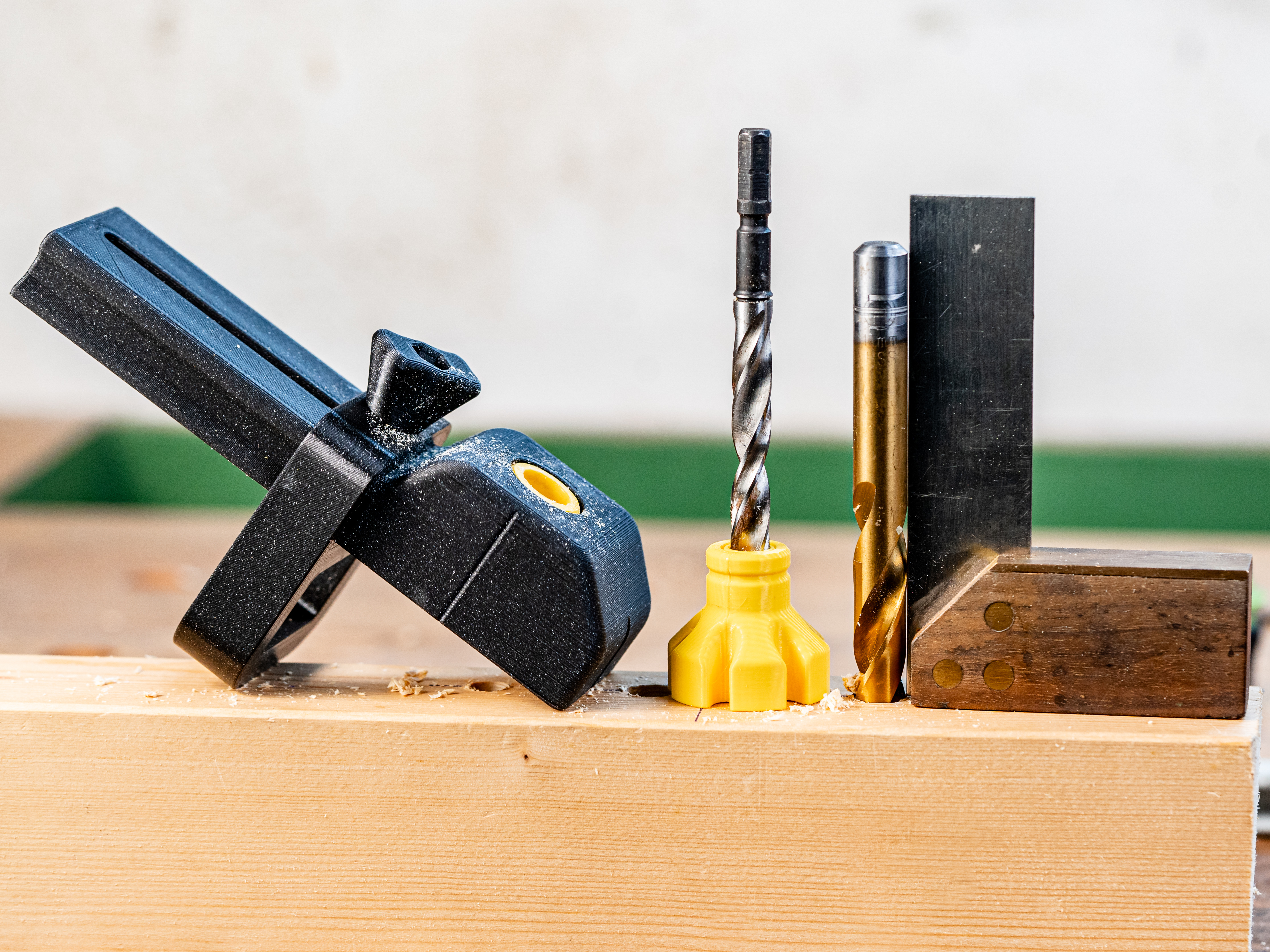 Adjustable Drill guide with stop and replaceable guide elements