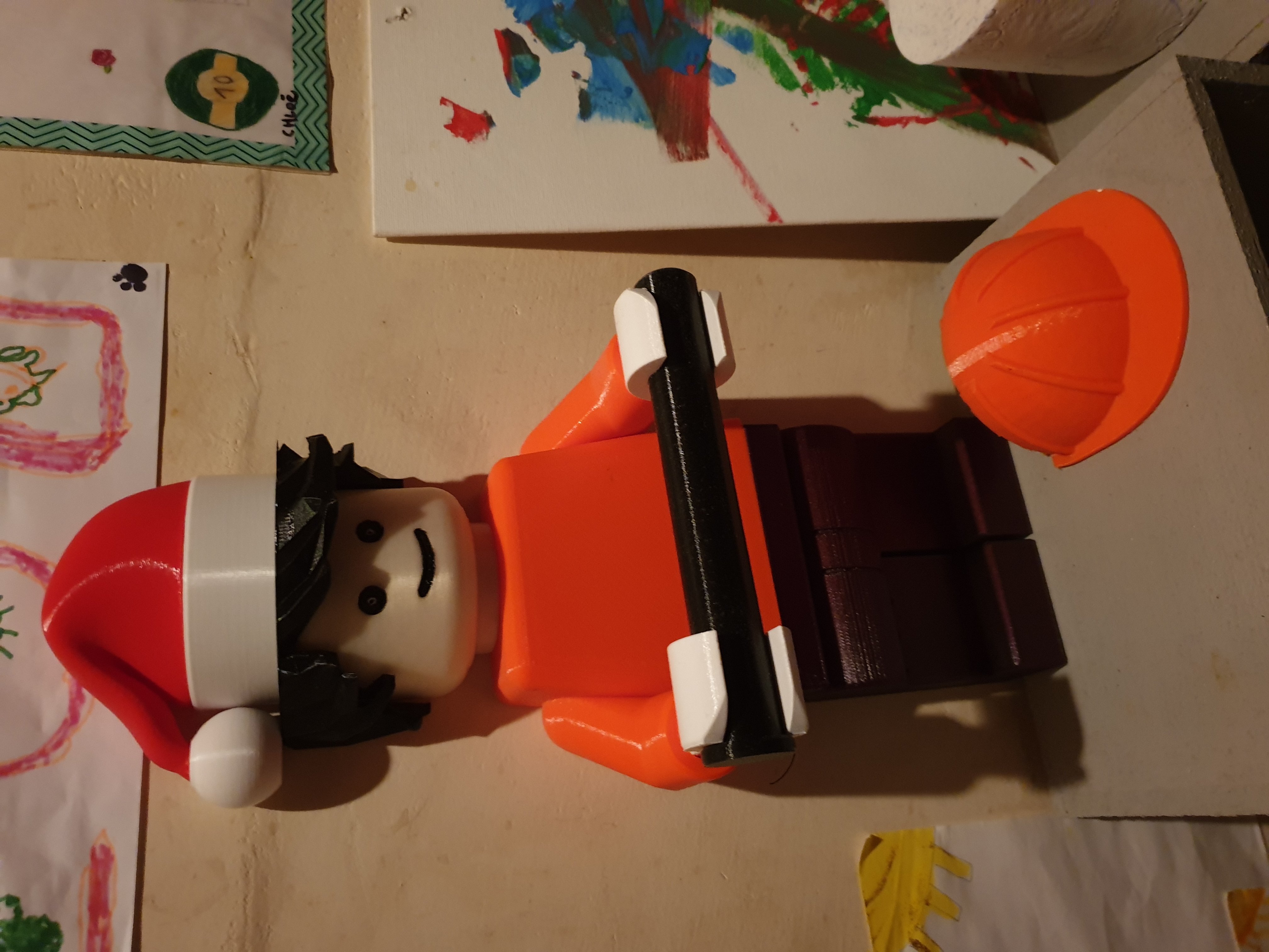 Lego man toilet paper - Shorter hands for larger rolls