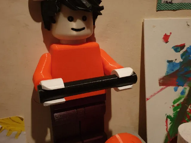 Lego man toilet paper - Shorter hands for larger rolls