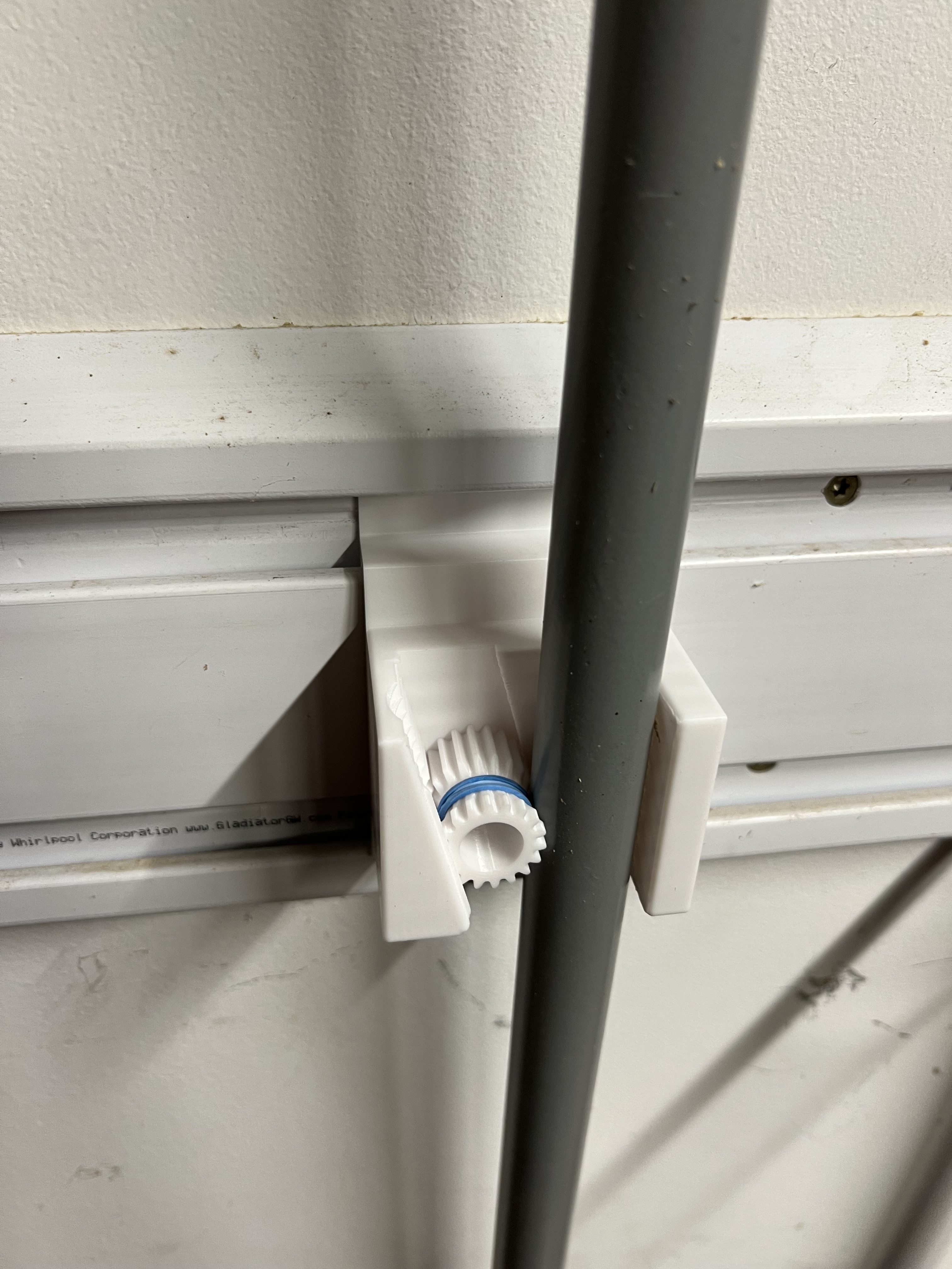 Gladiator Wall System Gravity Broom Holder