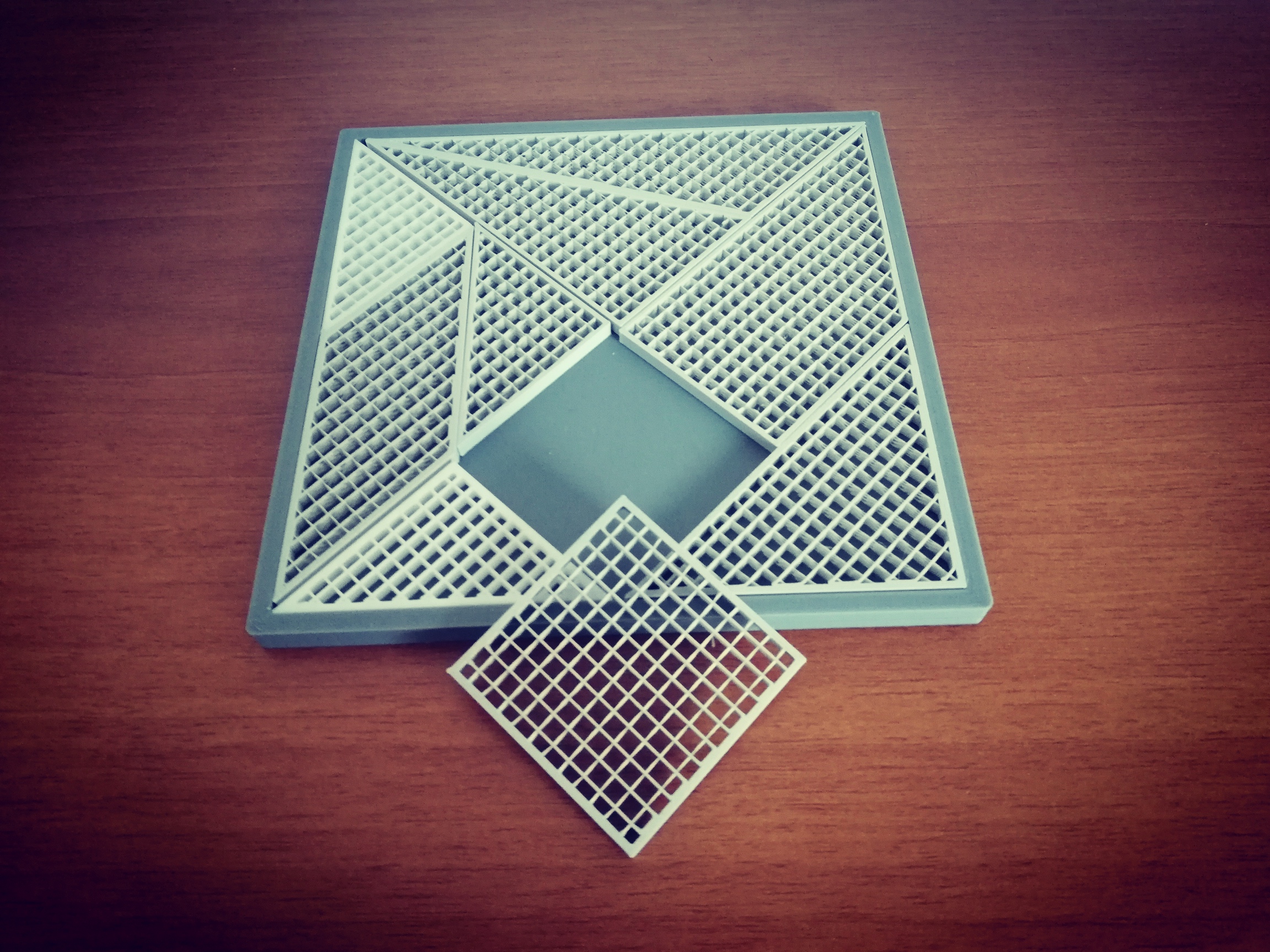 Tangram similar puzzle with 9 pieces