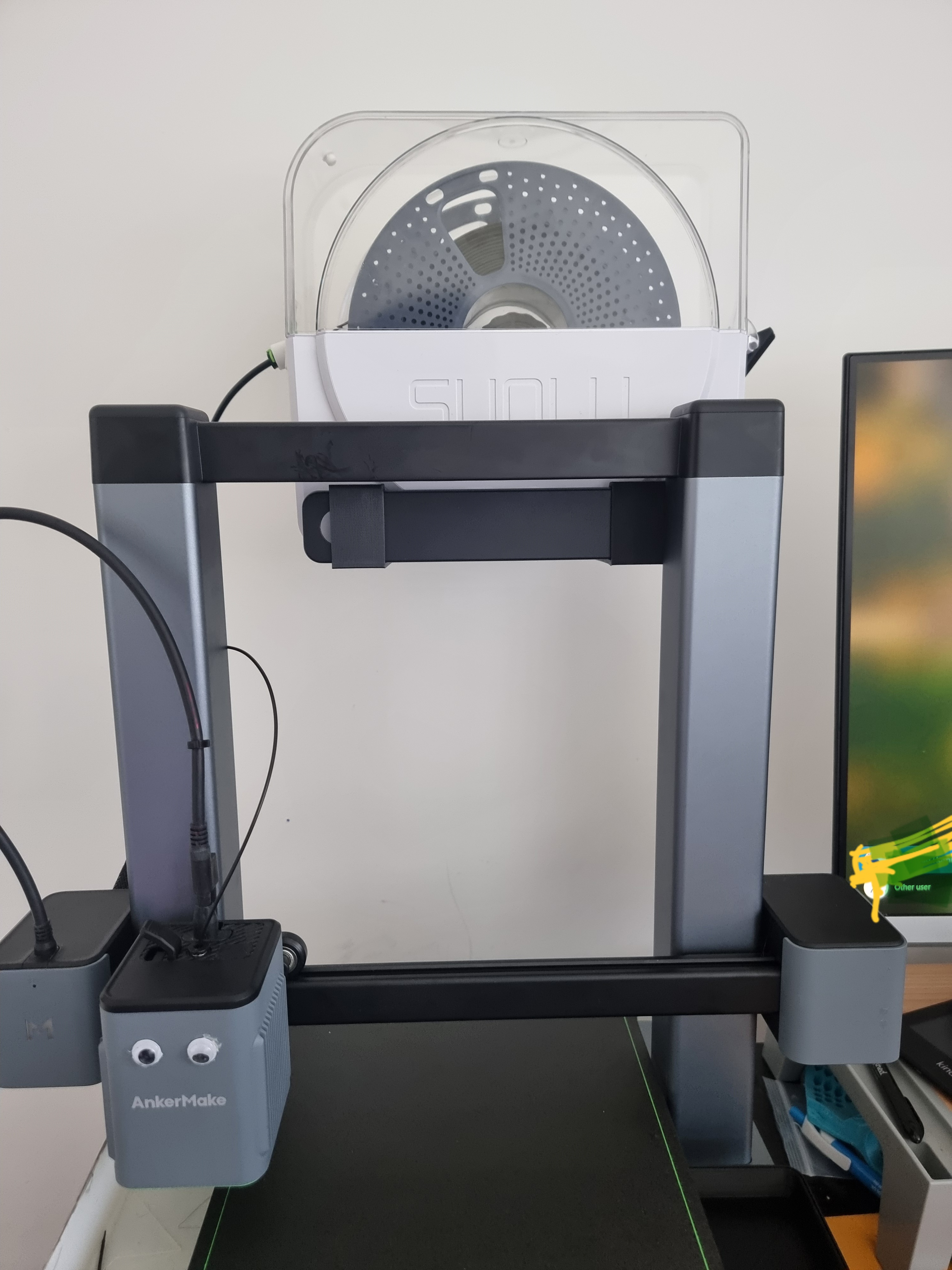 A Sunlu S1 holder for Ankermake m5c with spool holder reused