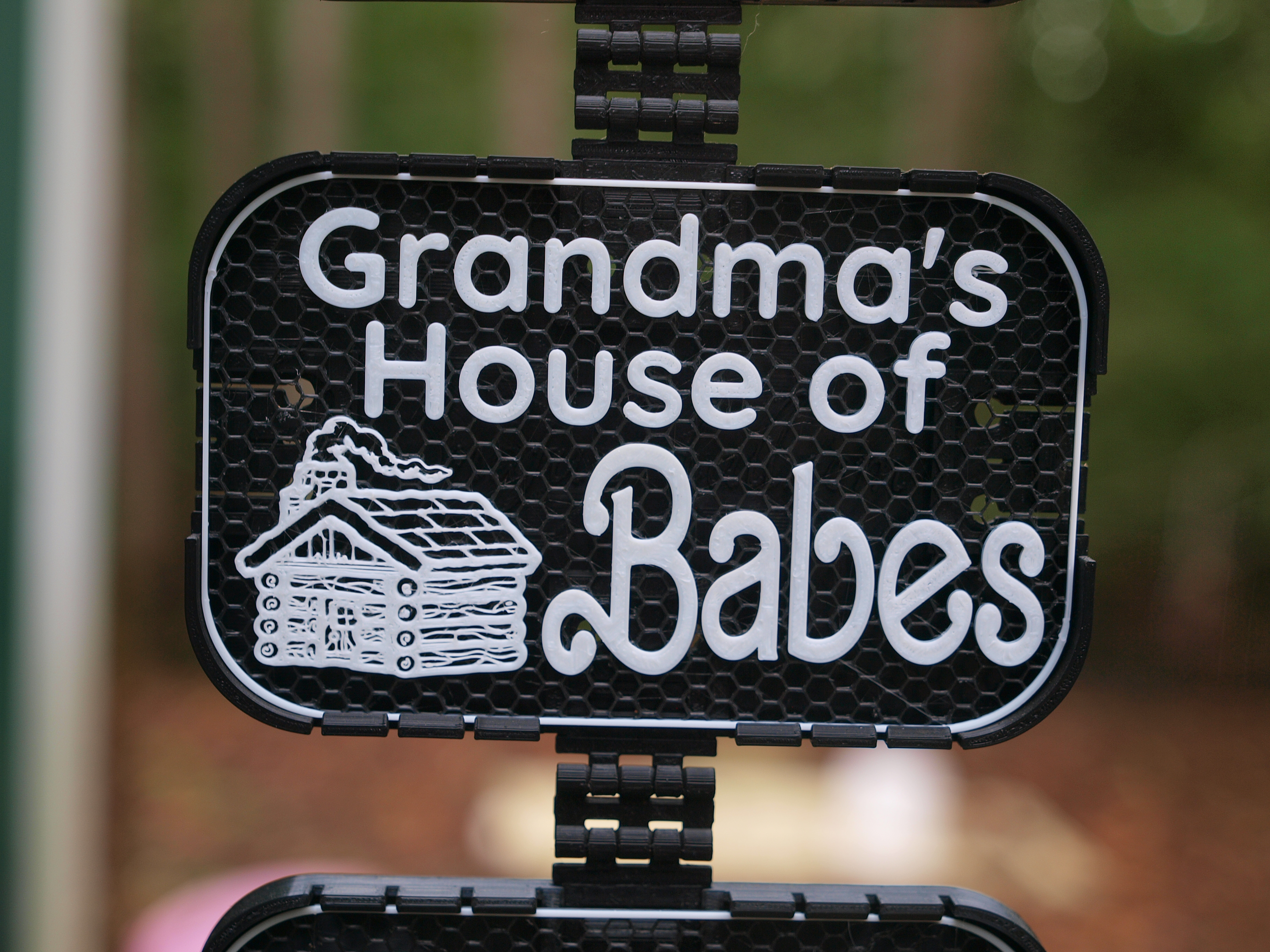 Grandma's House of Babes sign