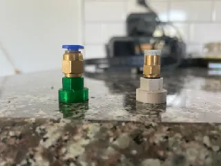 Magnetic PTFE coupler
