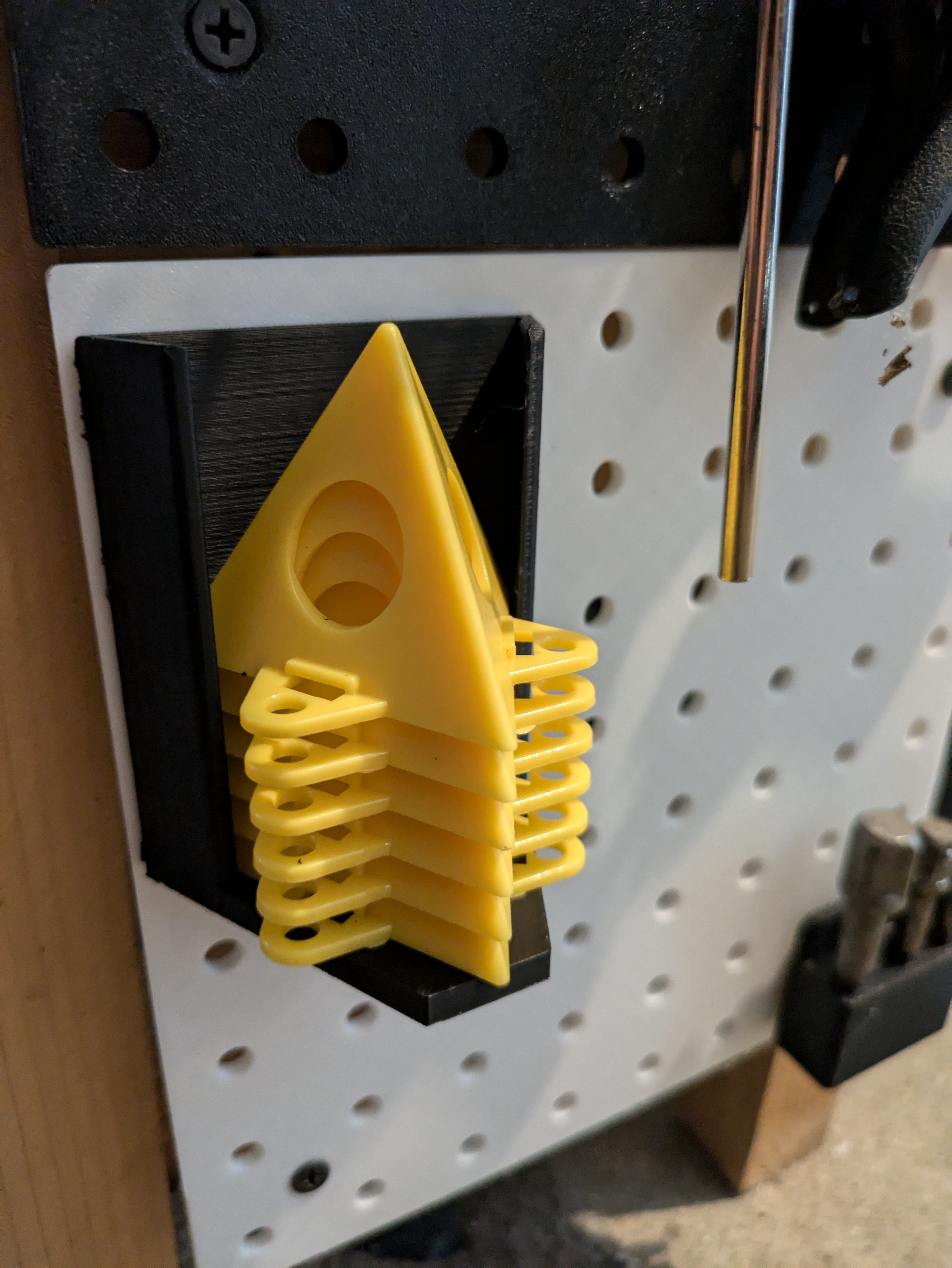 Paint pyramid holder for pegboard (resized)