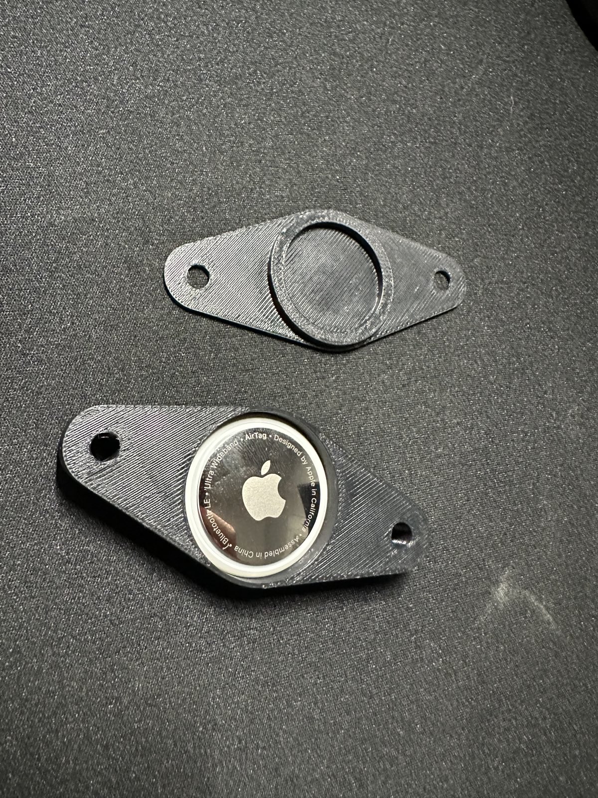 airtag vault under bicycle water bottle cage
