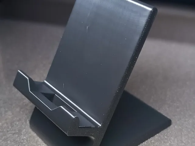 Phone holder with charging port