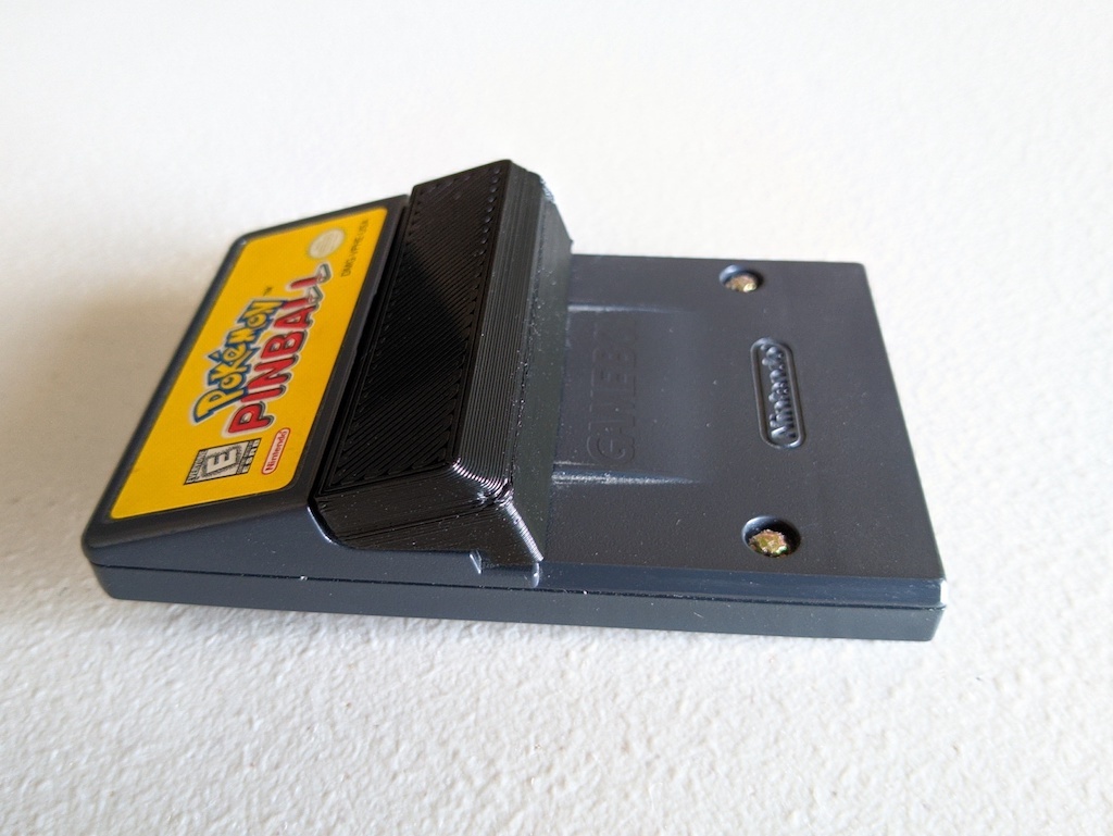 Rumble pack battery cover for Gameboy games