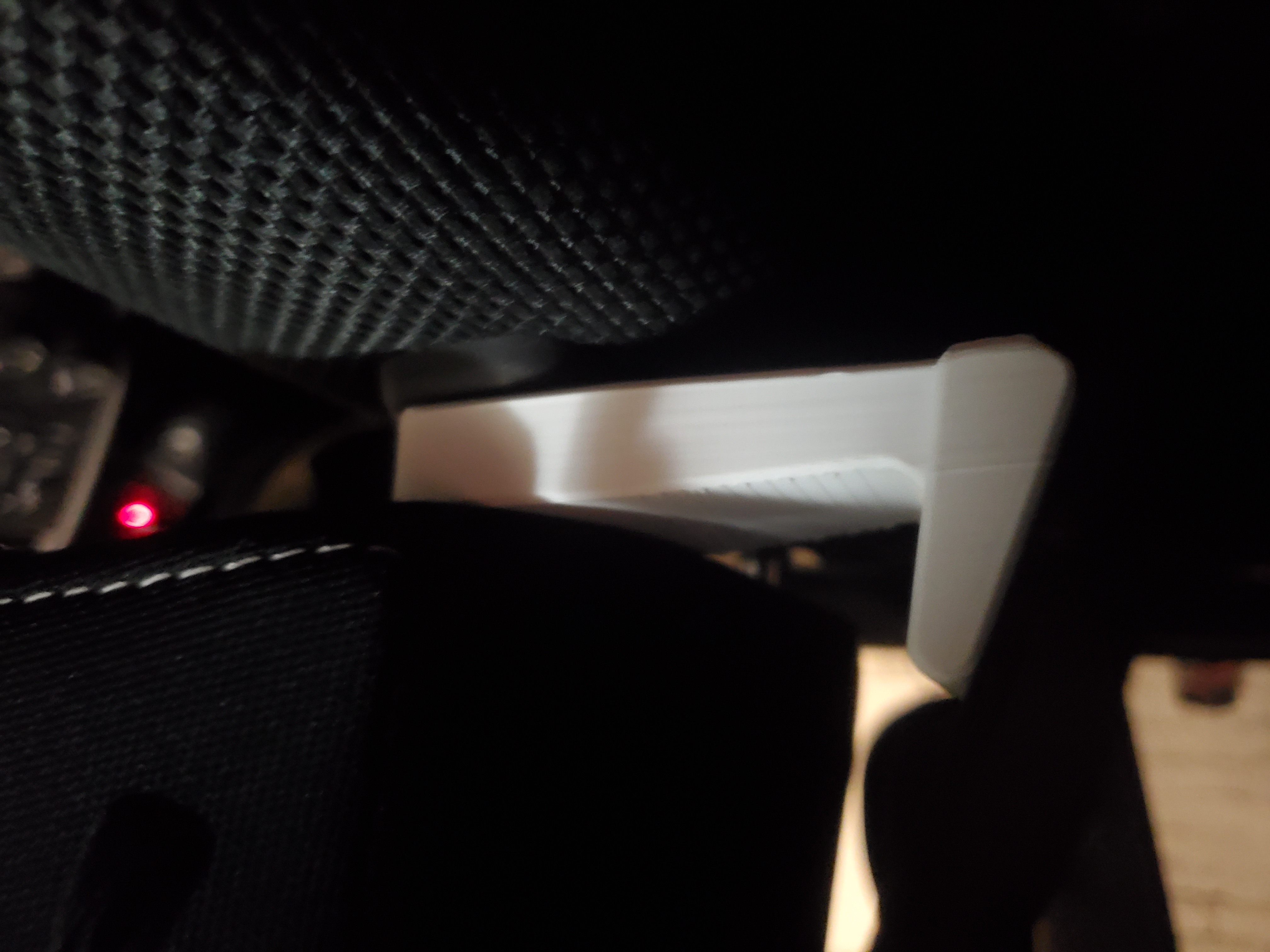 Headrest hook with shade mount