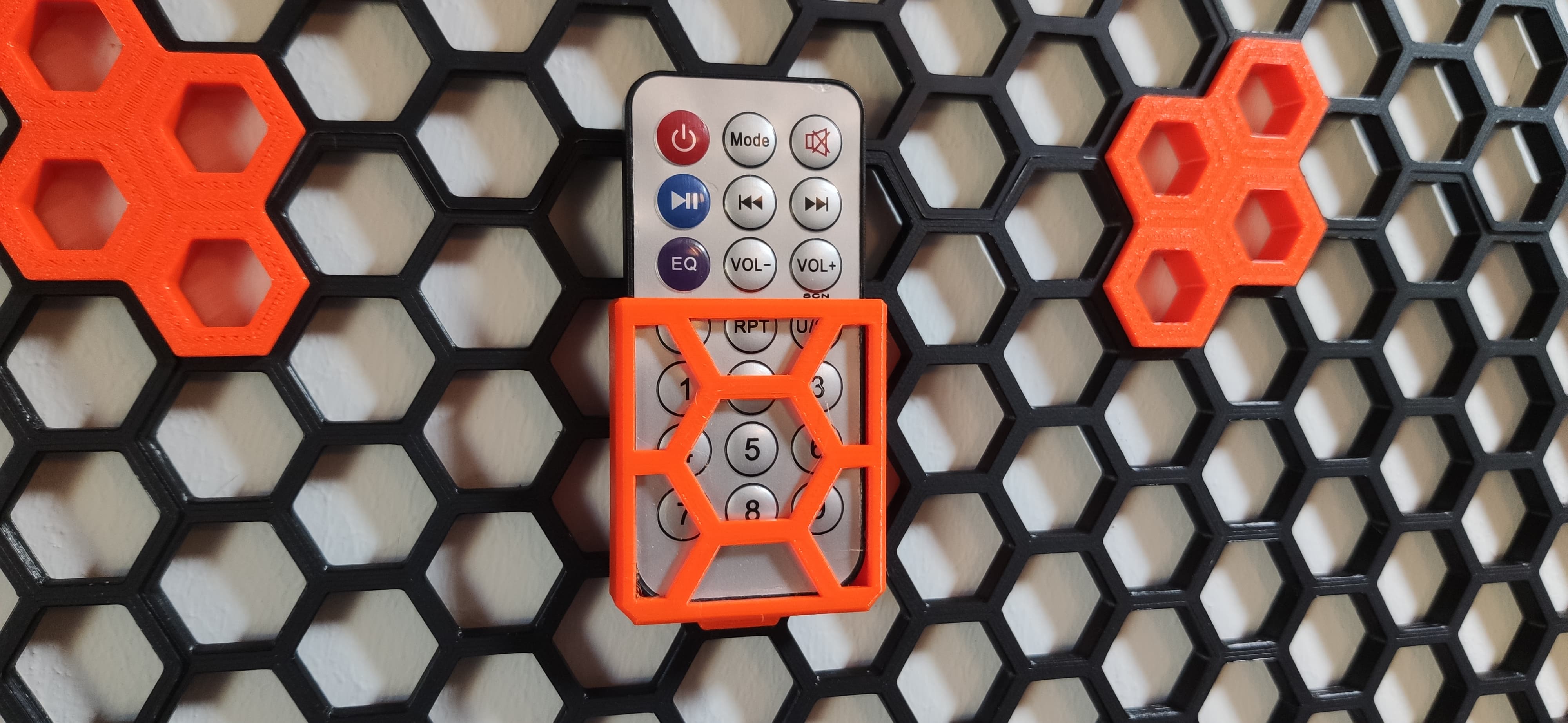 Remote holder honeycomb storage wall