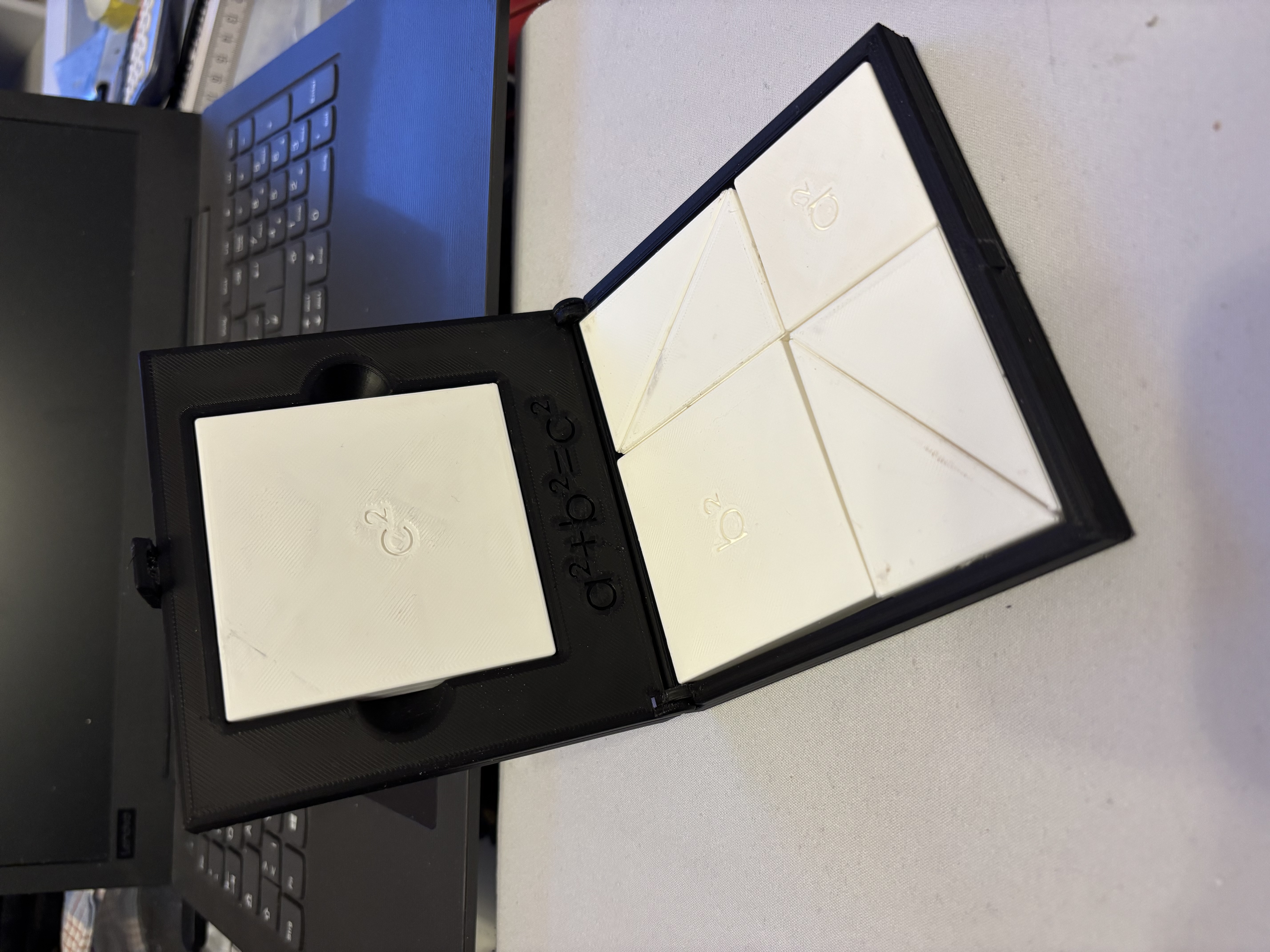 Optical Proof of Pythagoras' Theorem Puzzle