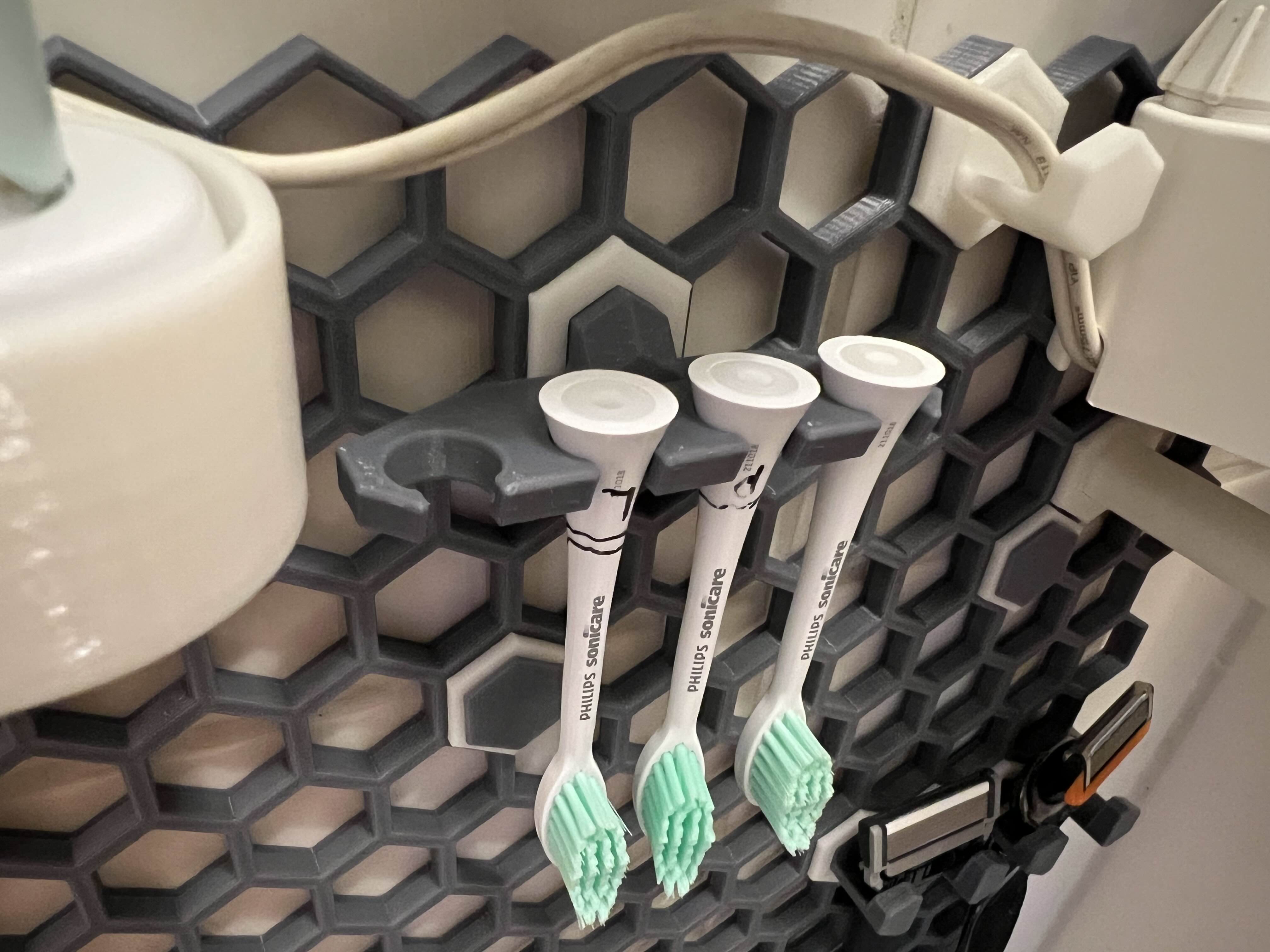 sonicare toothbrush head holder using honeycomb system