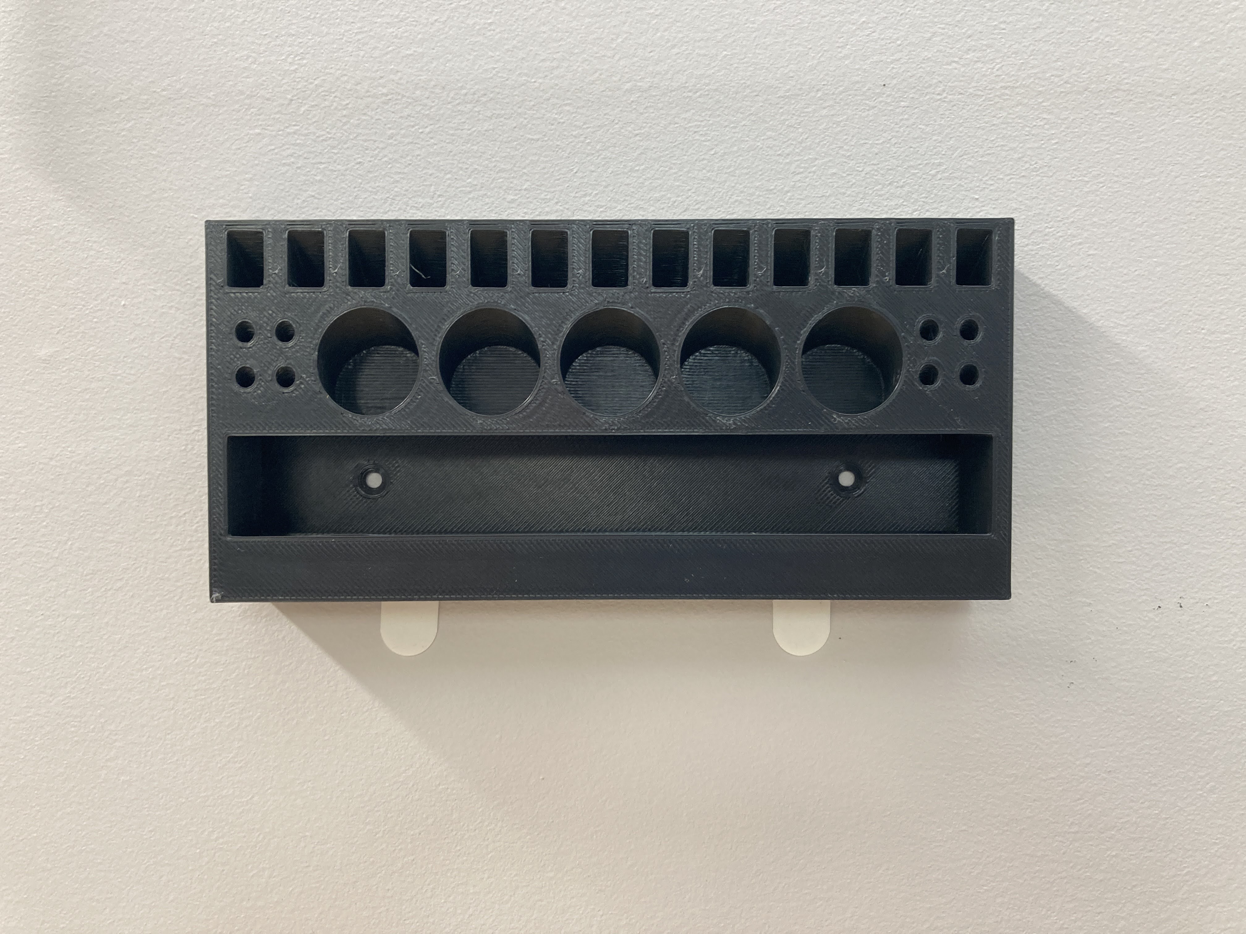 Wall mounted Industrial Sewing Machine Accessories Organizer by tessier