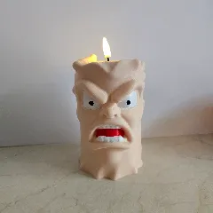 Angry face candle