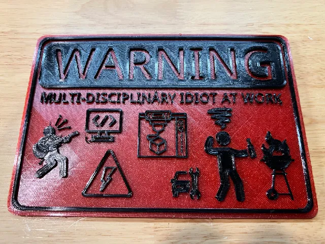 WARNING Multi-Disciplinary Idiot at Work Sign