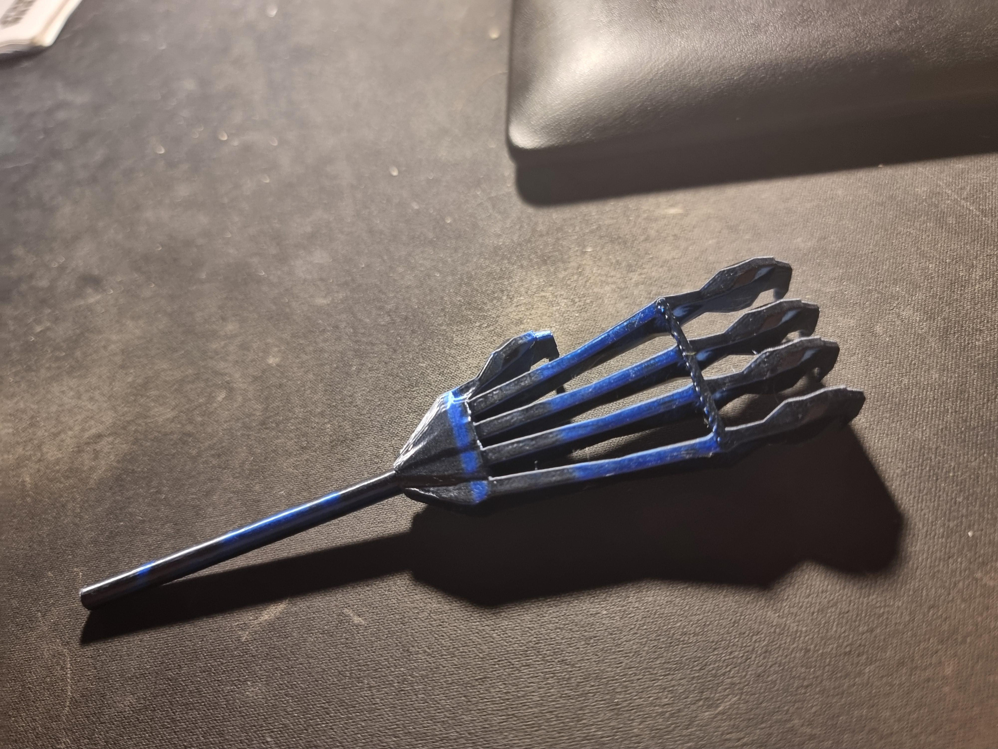 Skeletal back scratcher