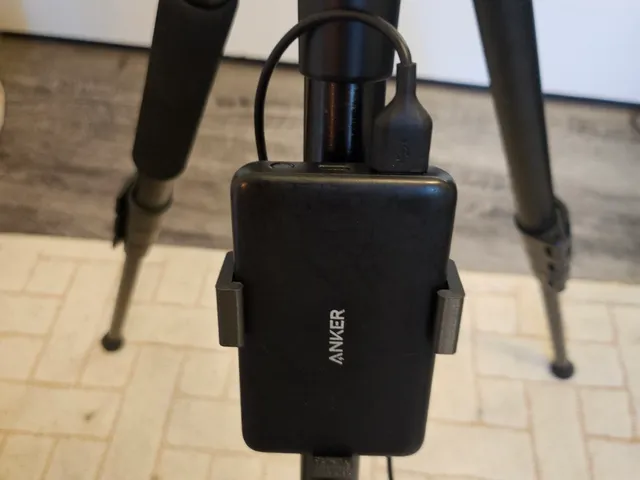 Tripod battery holder