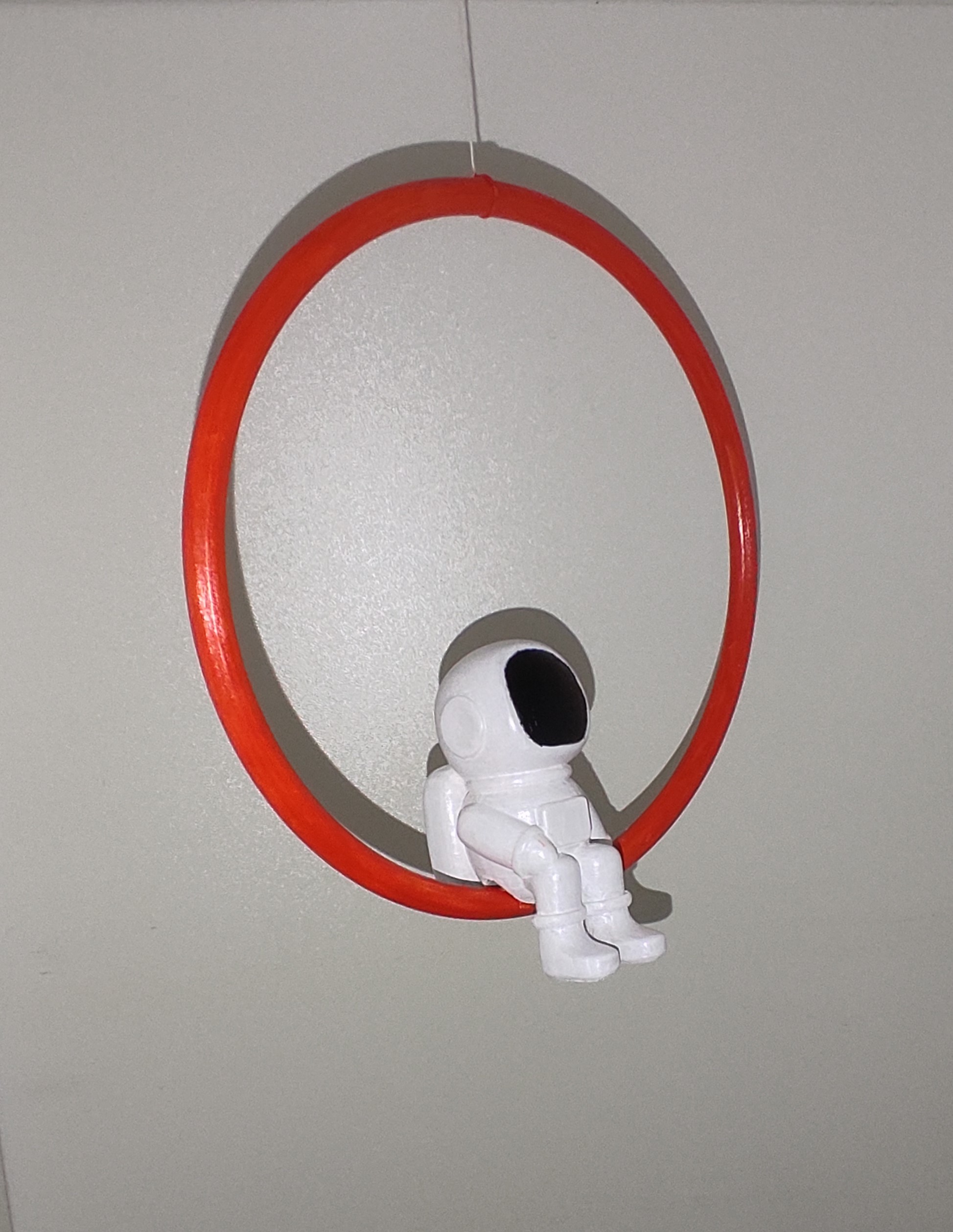 Floating astronaut on a ring
