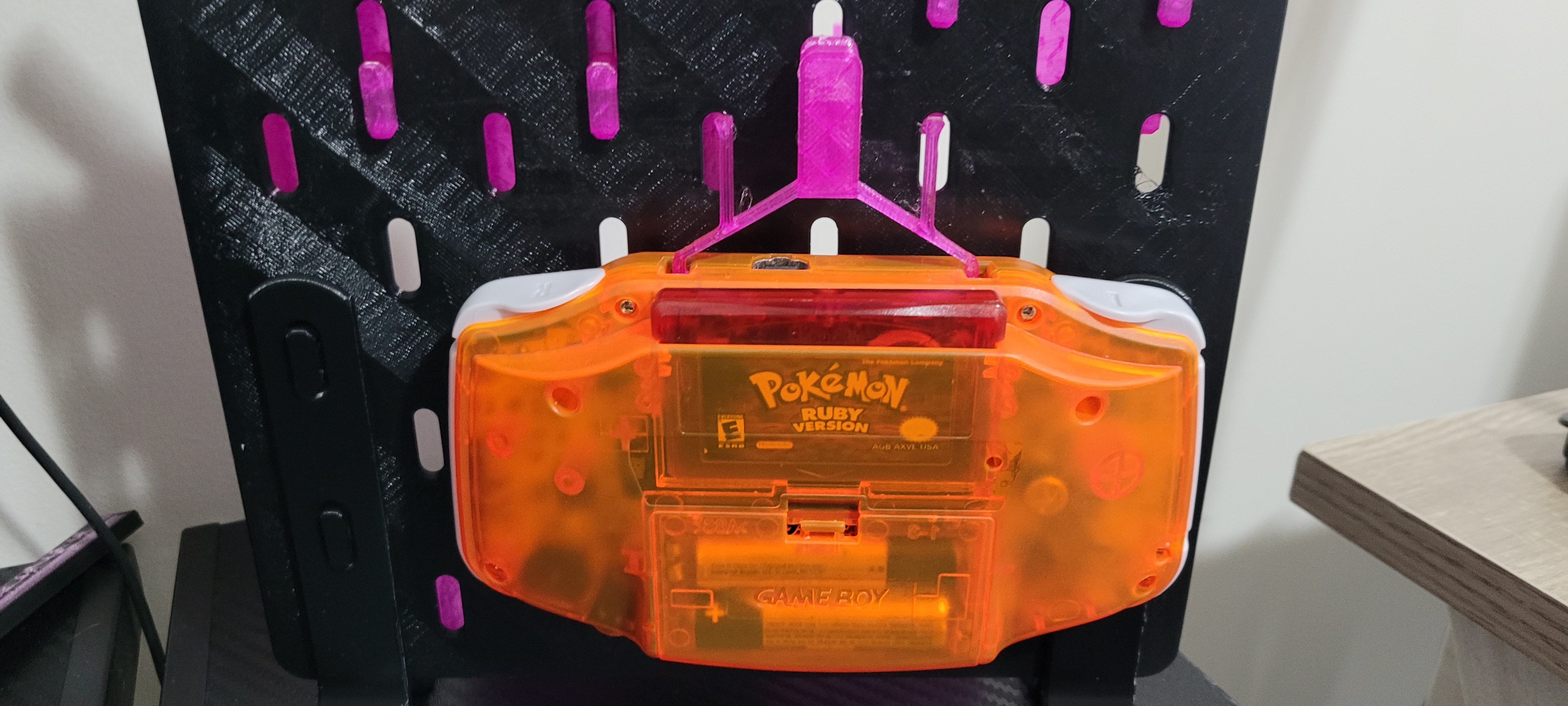 Pegboard hanger for gameboy advance