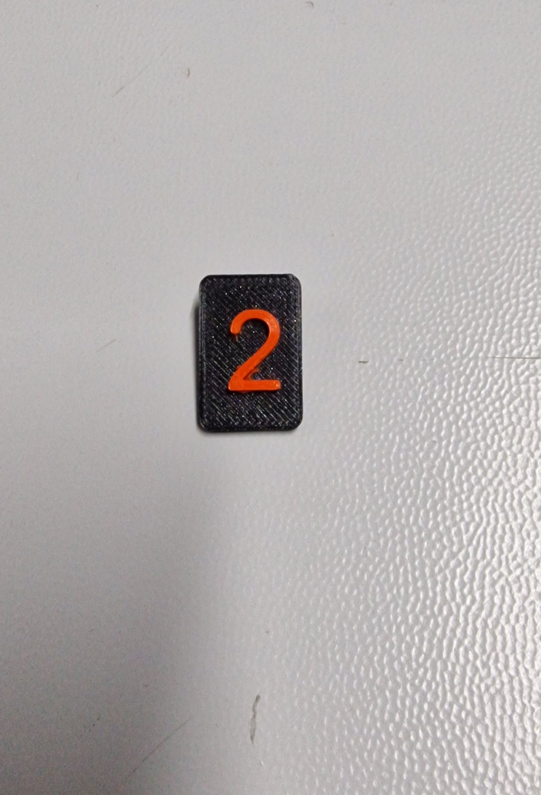 Universal clip-on labels for PTFE tube