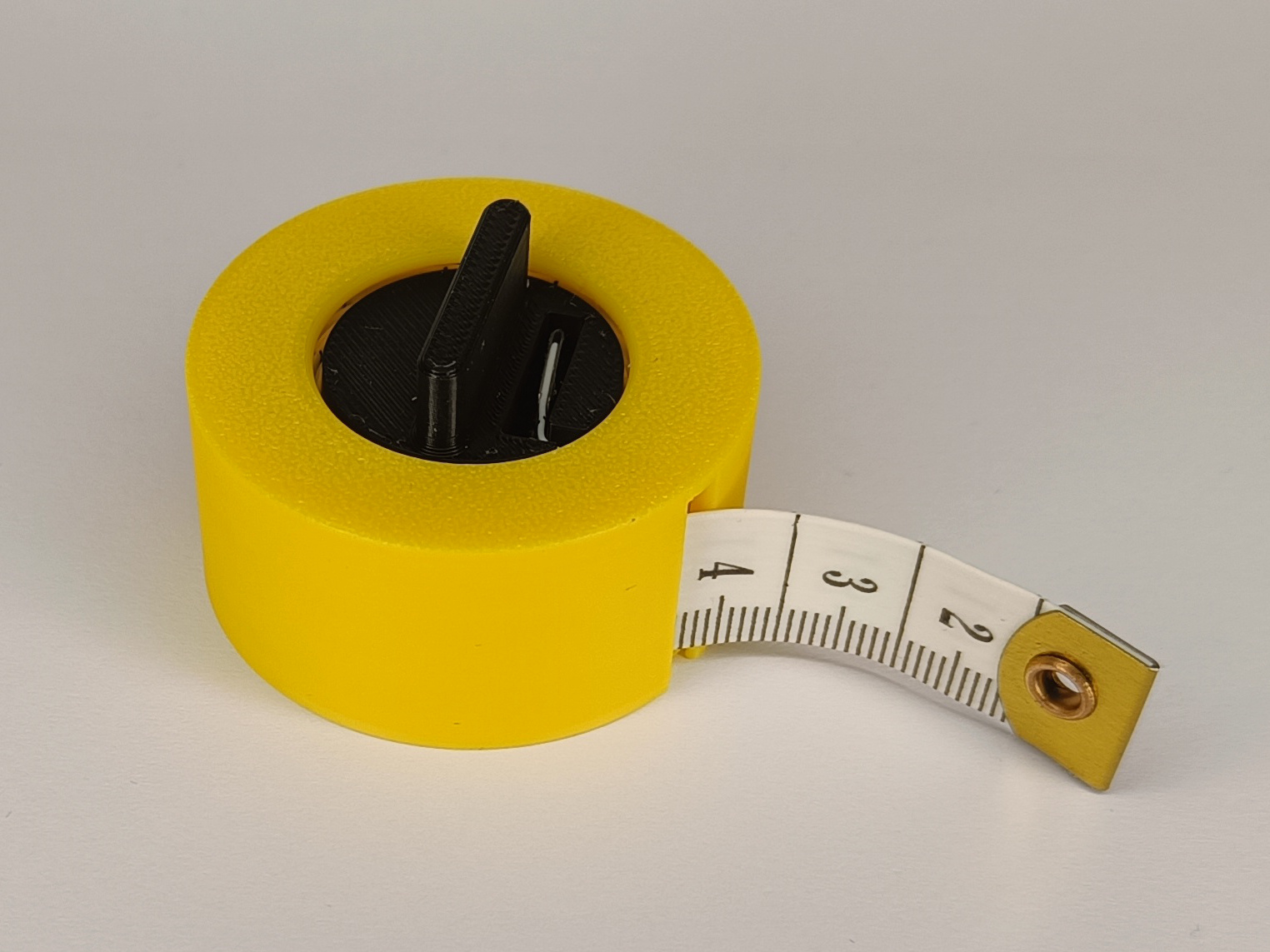 Parametric measure tape holder by Daniel Alberski Download free STL