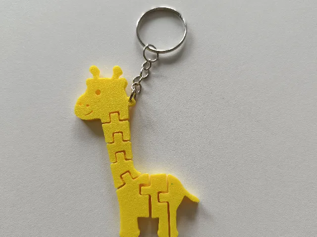 Flexi giraffe pendant