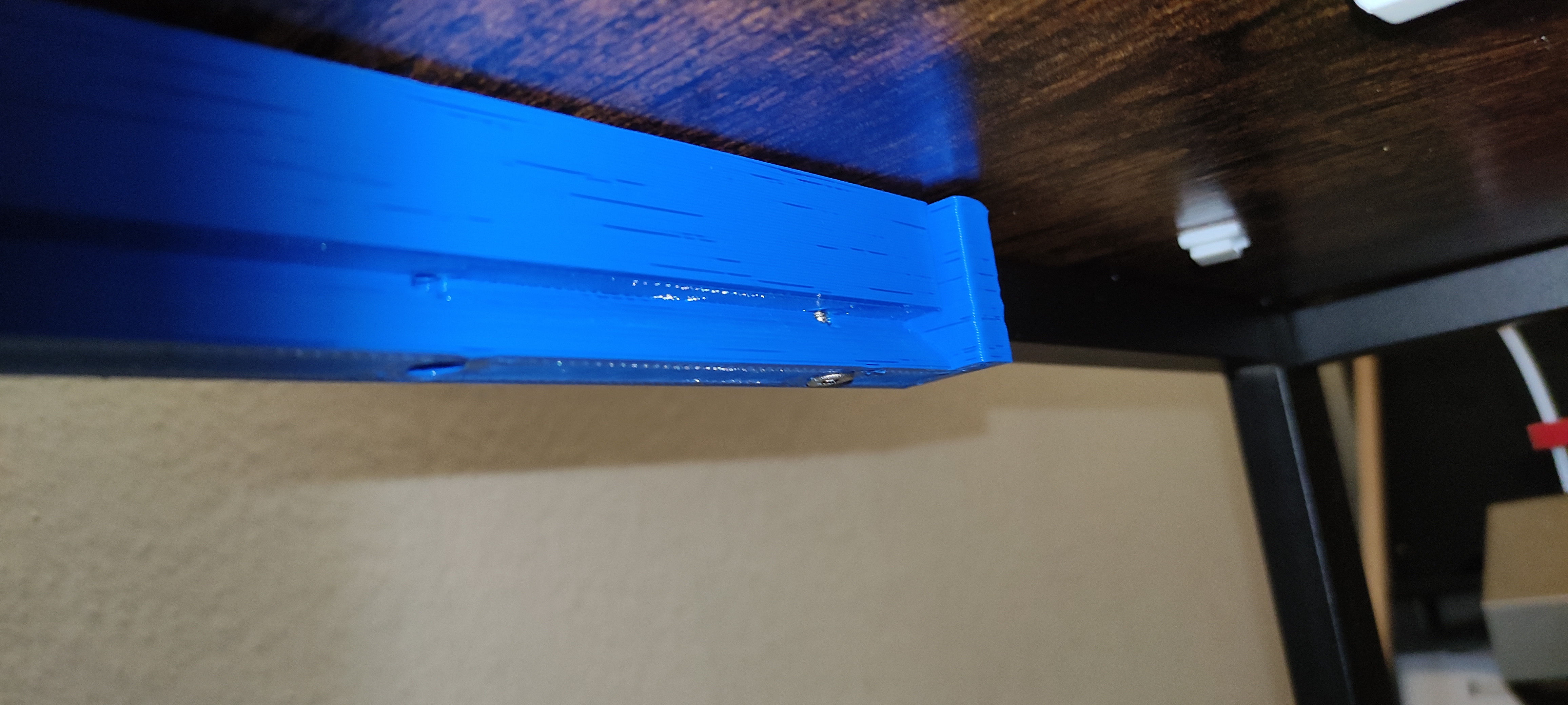 Sliding trash can mounting brackets with end stops