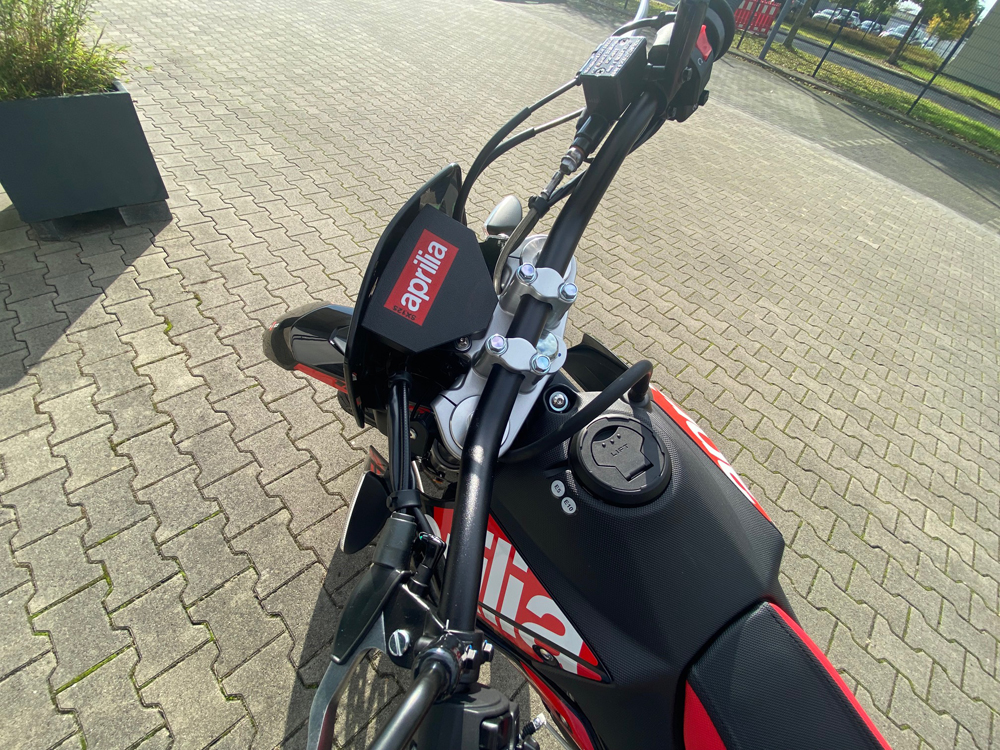 APRILIA SX125 Tachometer & Ignition Lock Cover