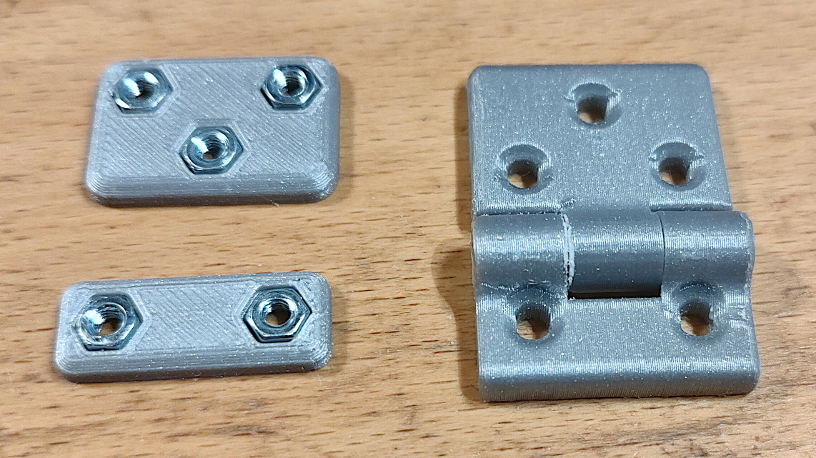 Assymetric hinge for small box