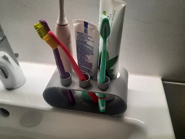 Toothbrush and toothpaste holder