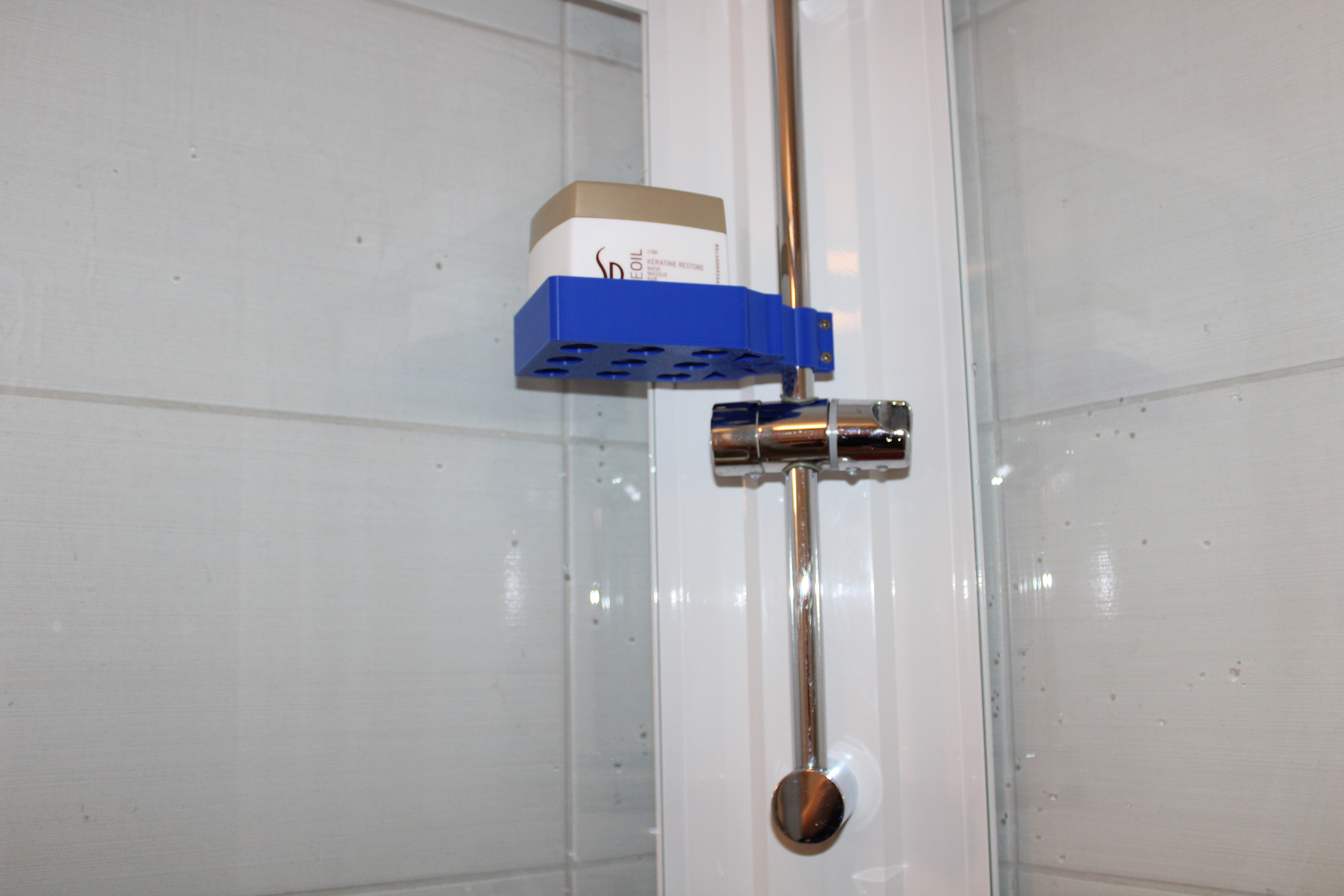Arm for extra equipment-shower