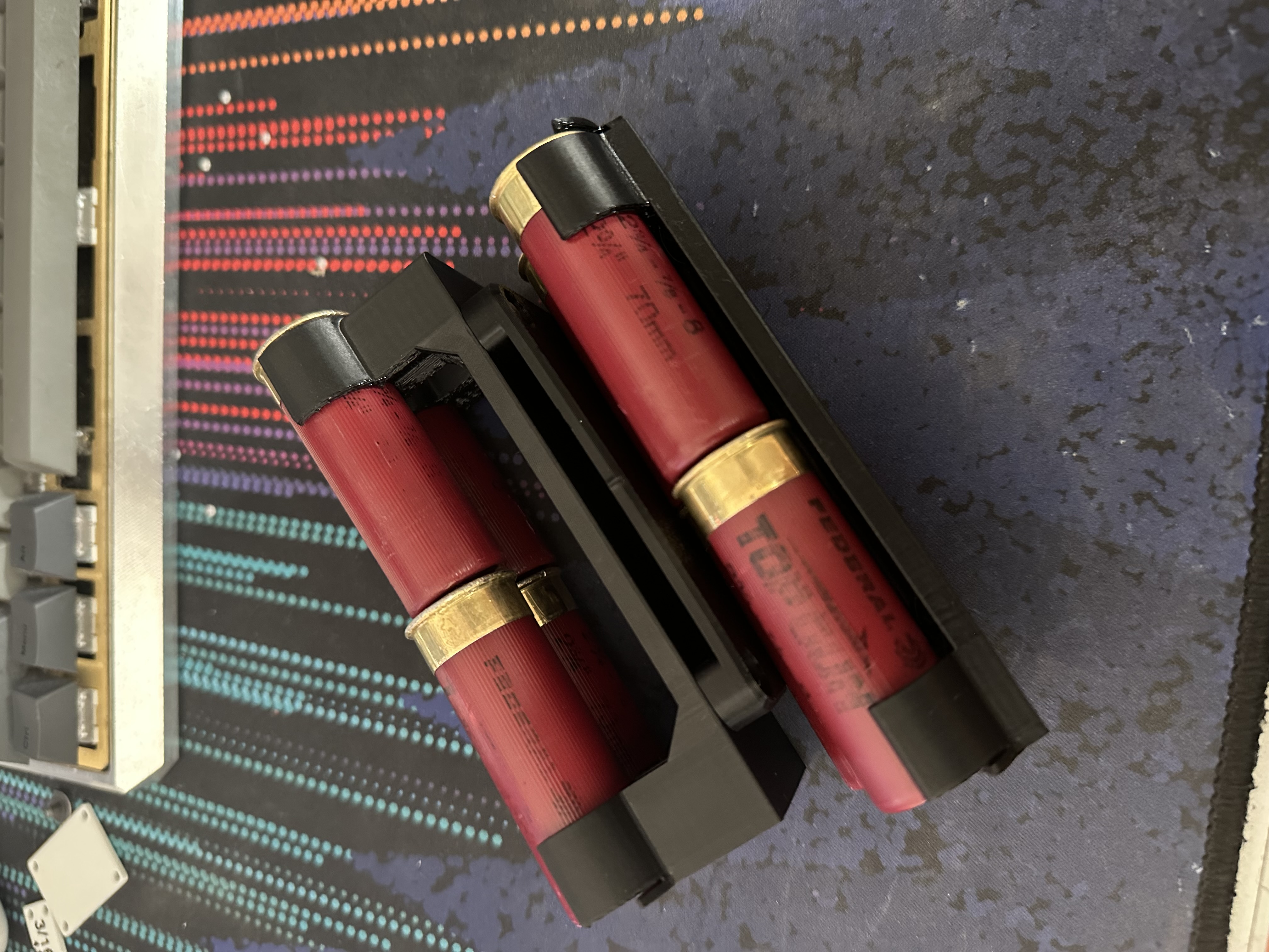 Quad loading shell caddy/holder
