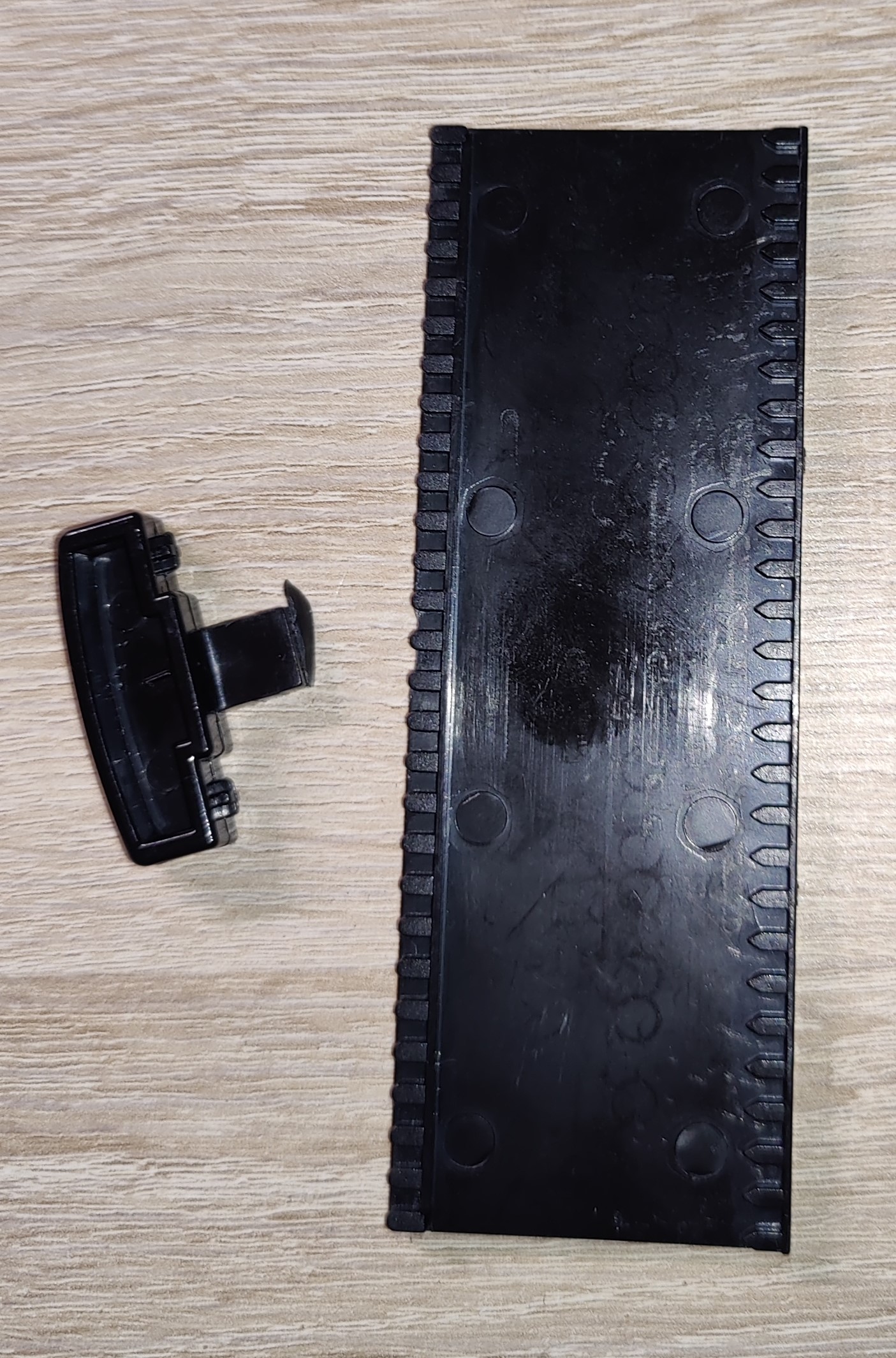 Ersatzteil für die Armlehnenverstellung eines Bürostuhls/ Spare part for the armrest adjustment of an office chair