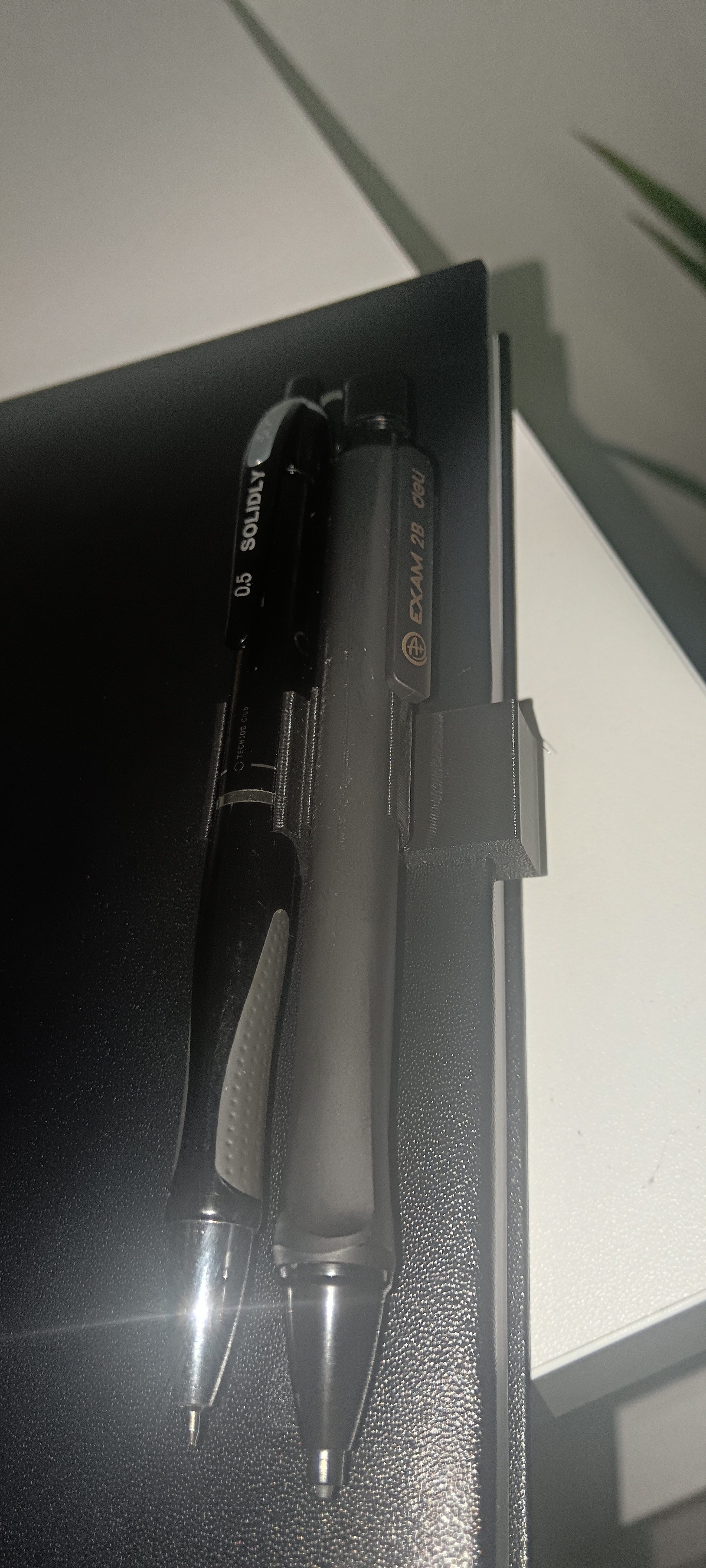 Notebook pen clip holder