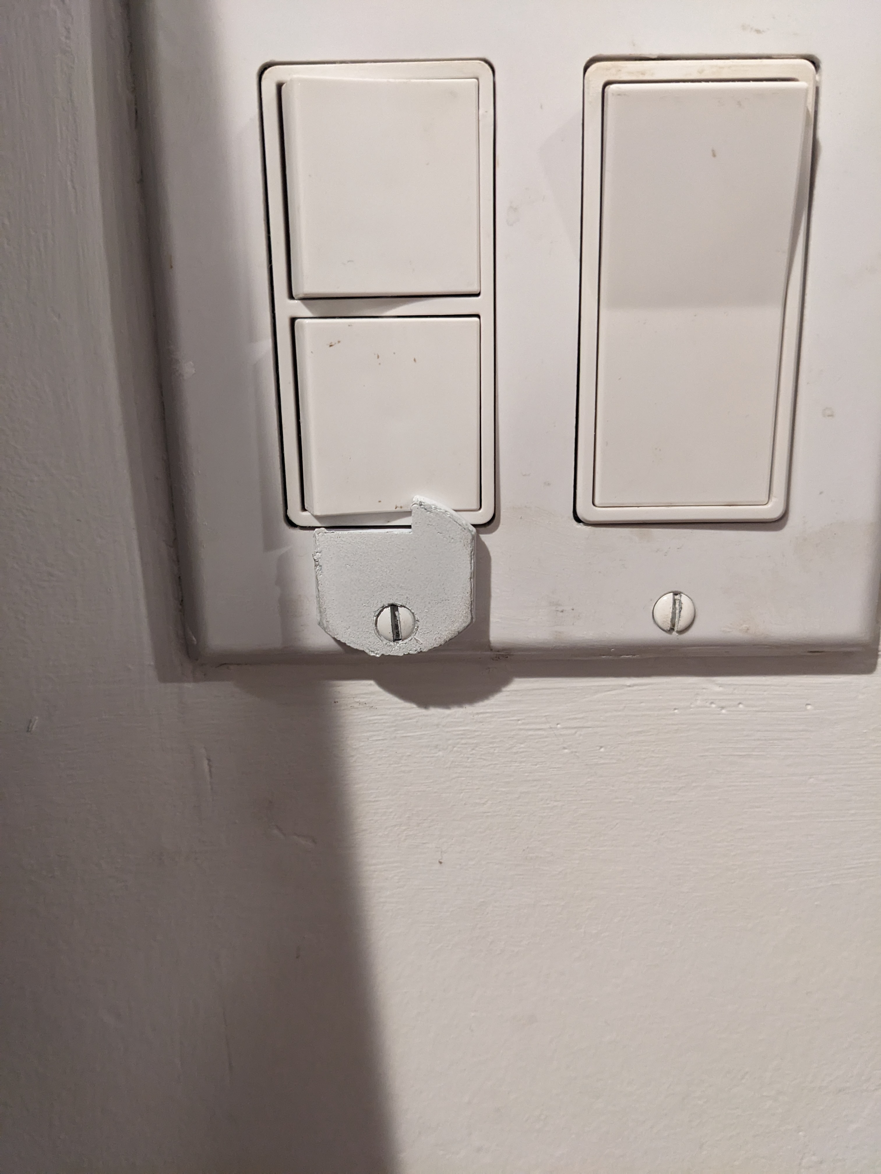 Switch lock for dual toggle switch