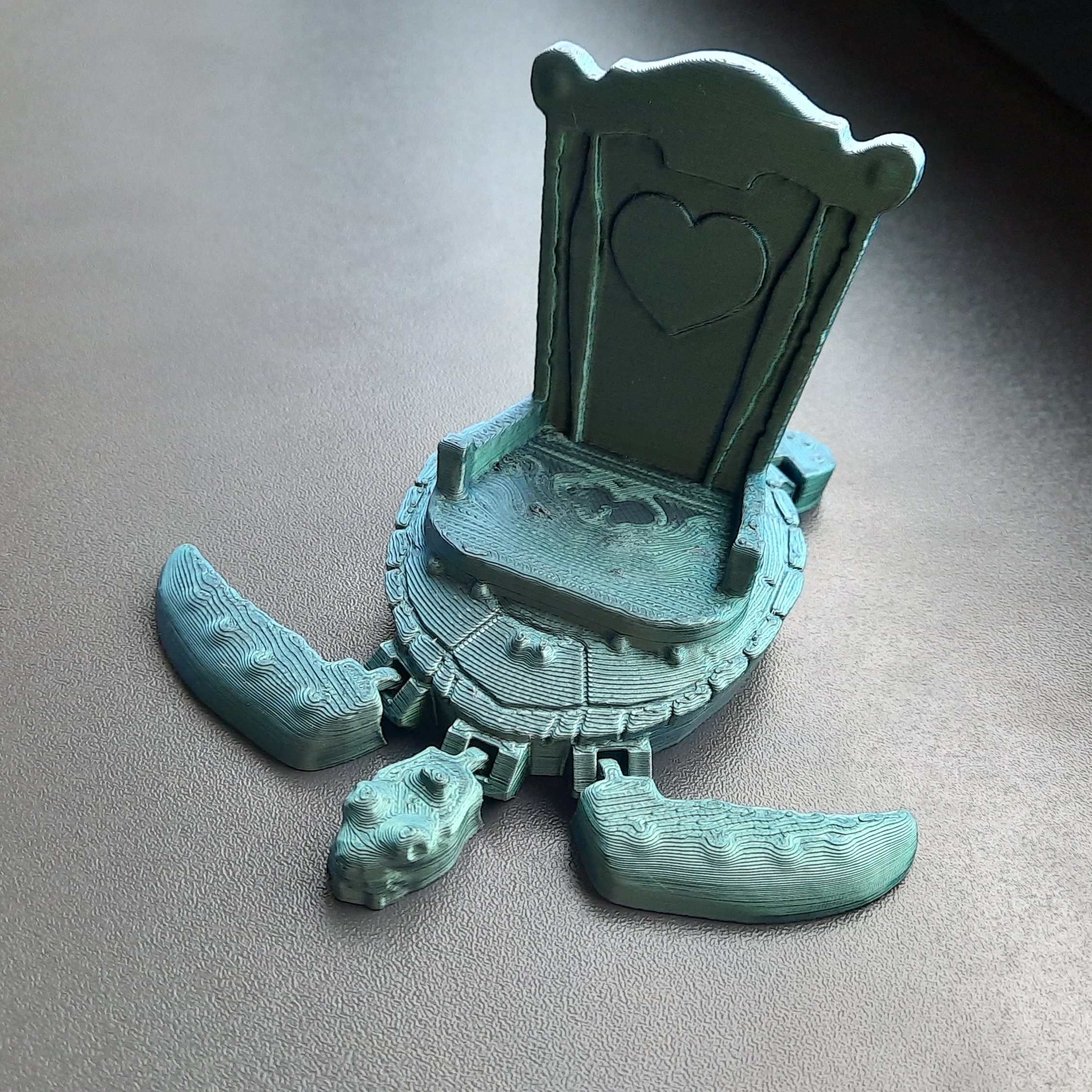 Phone holding surrealistic flexi turtle