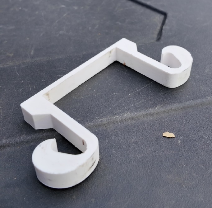 Trailer safety chains holder