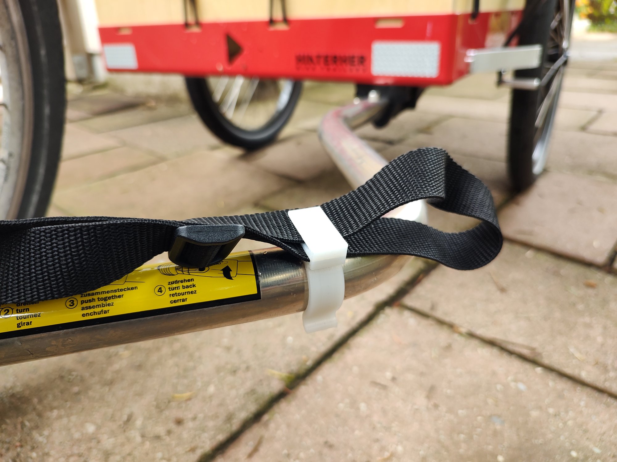 bicycle trailer strap clip | Schelle für Fahrradanhänger