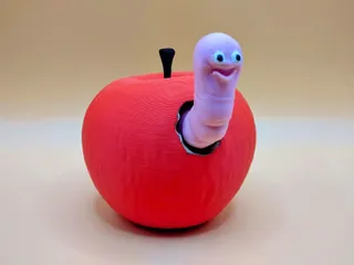 Apple with a smiling worm