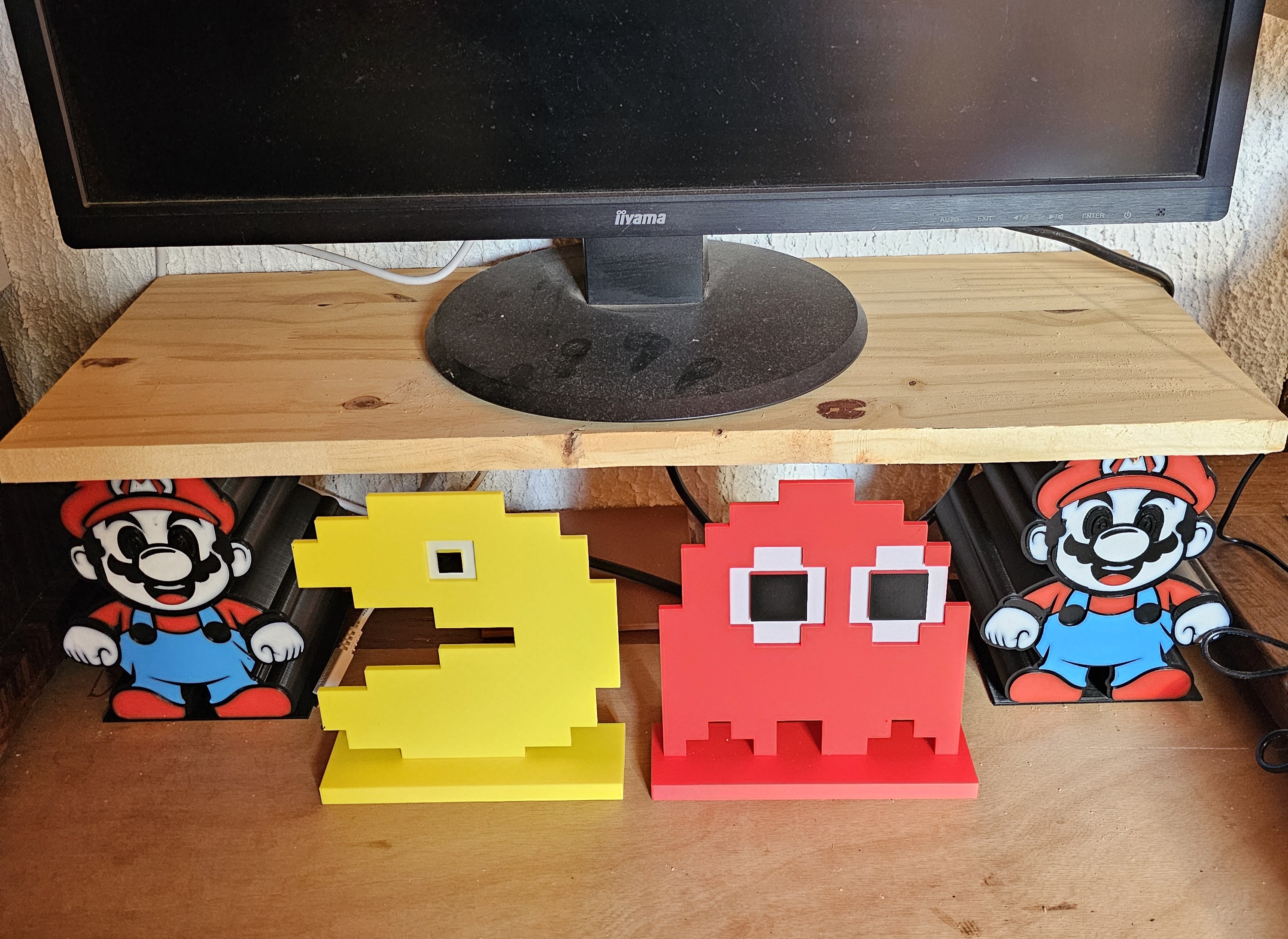 Retro gaming - Pacman and ghost with eyes and support