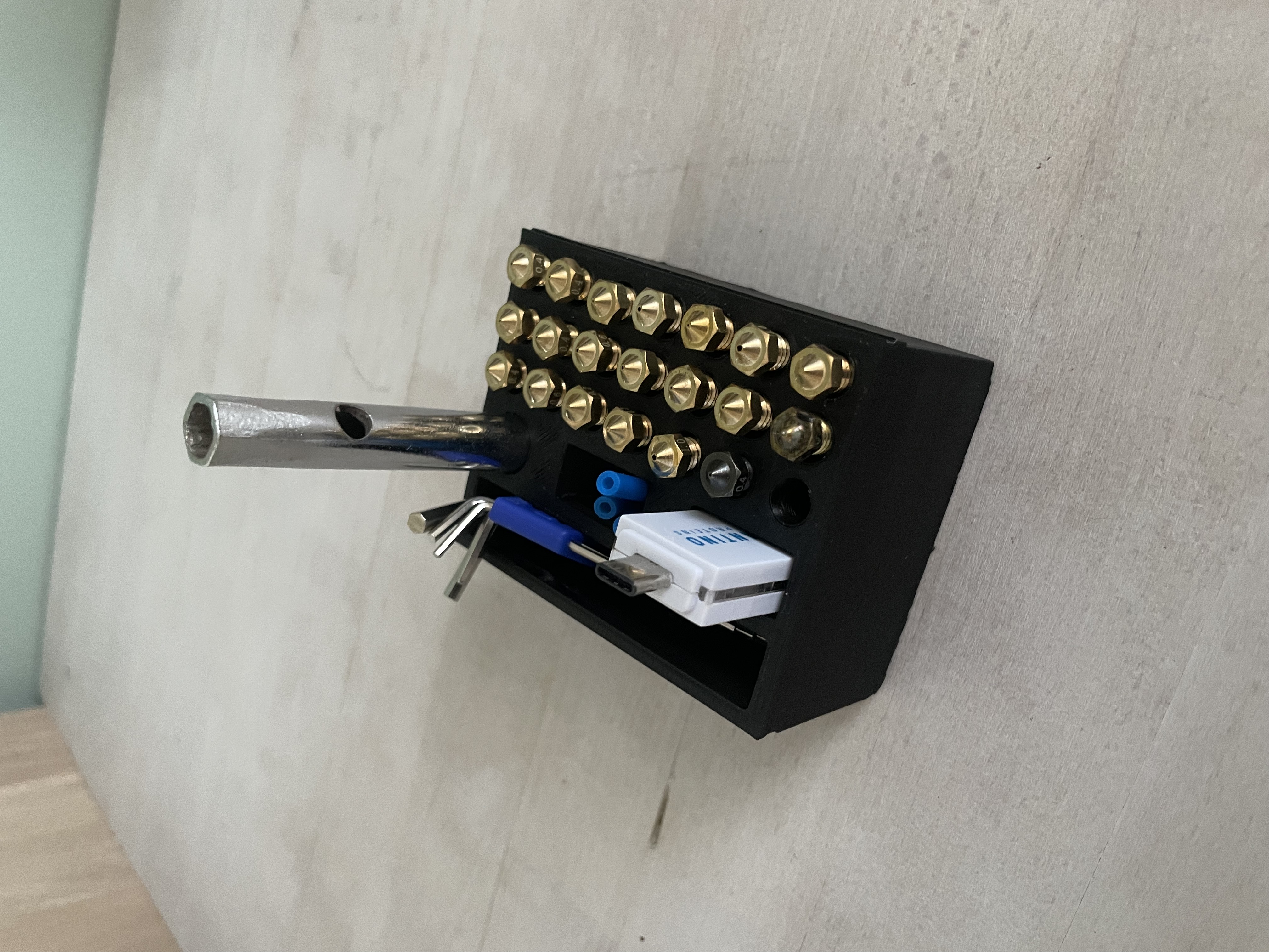 Nozzle and accessory holder for 3D printer by Enrico Turone Download