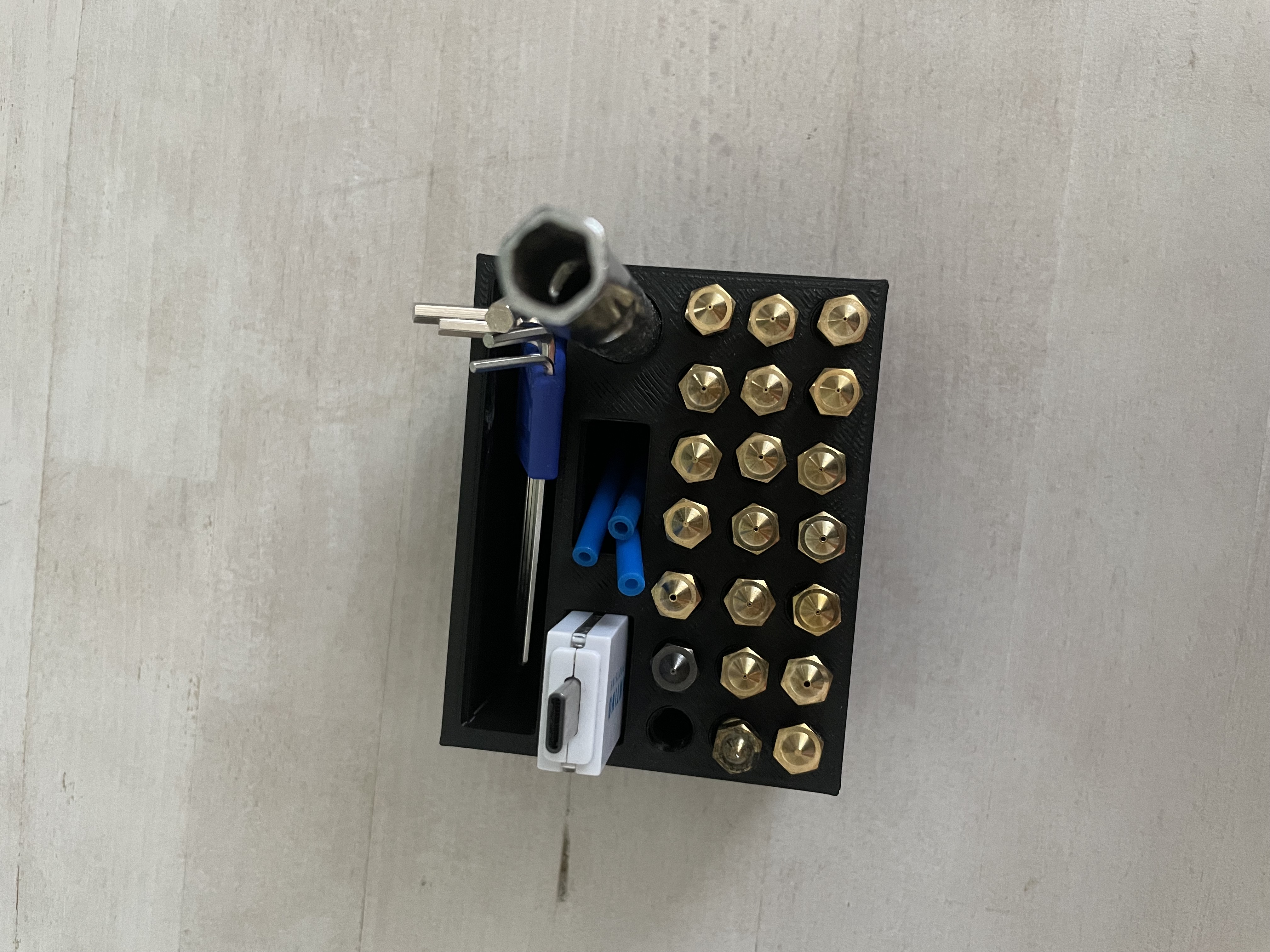 Nozzle and accessory holder for 3D printer by Enrico Turone Download