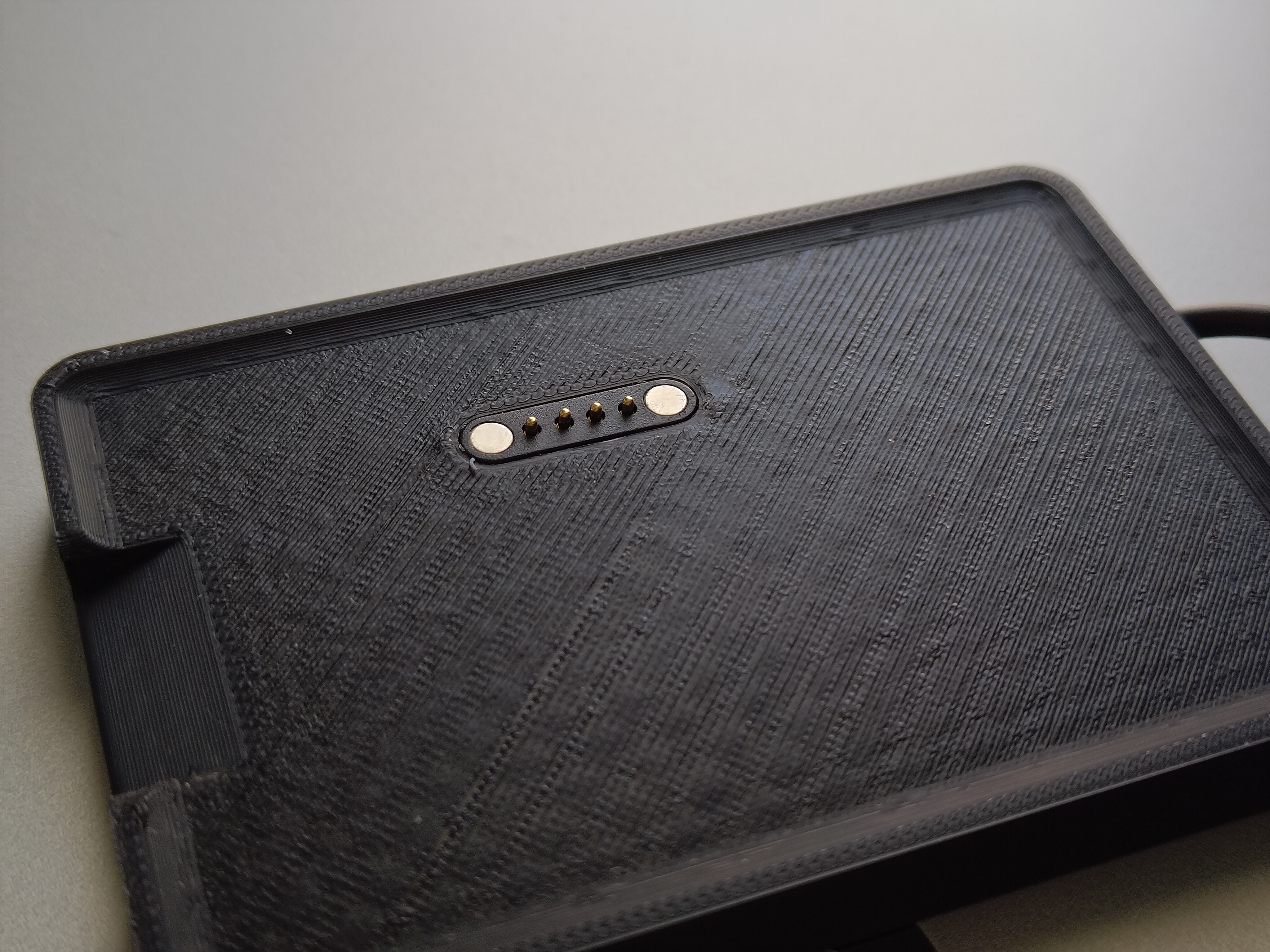Seeed Studio Sensecap T1000-E charging cradle/puck