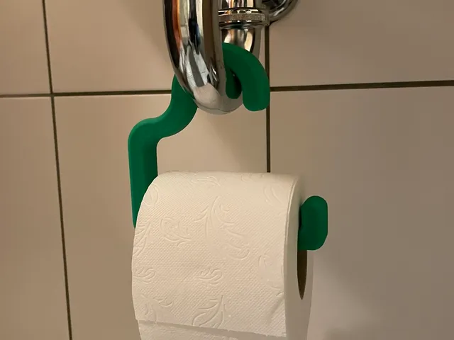 Toilet roll holder for faucet drain pipe
