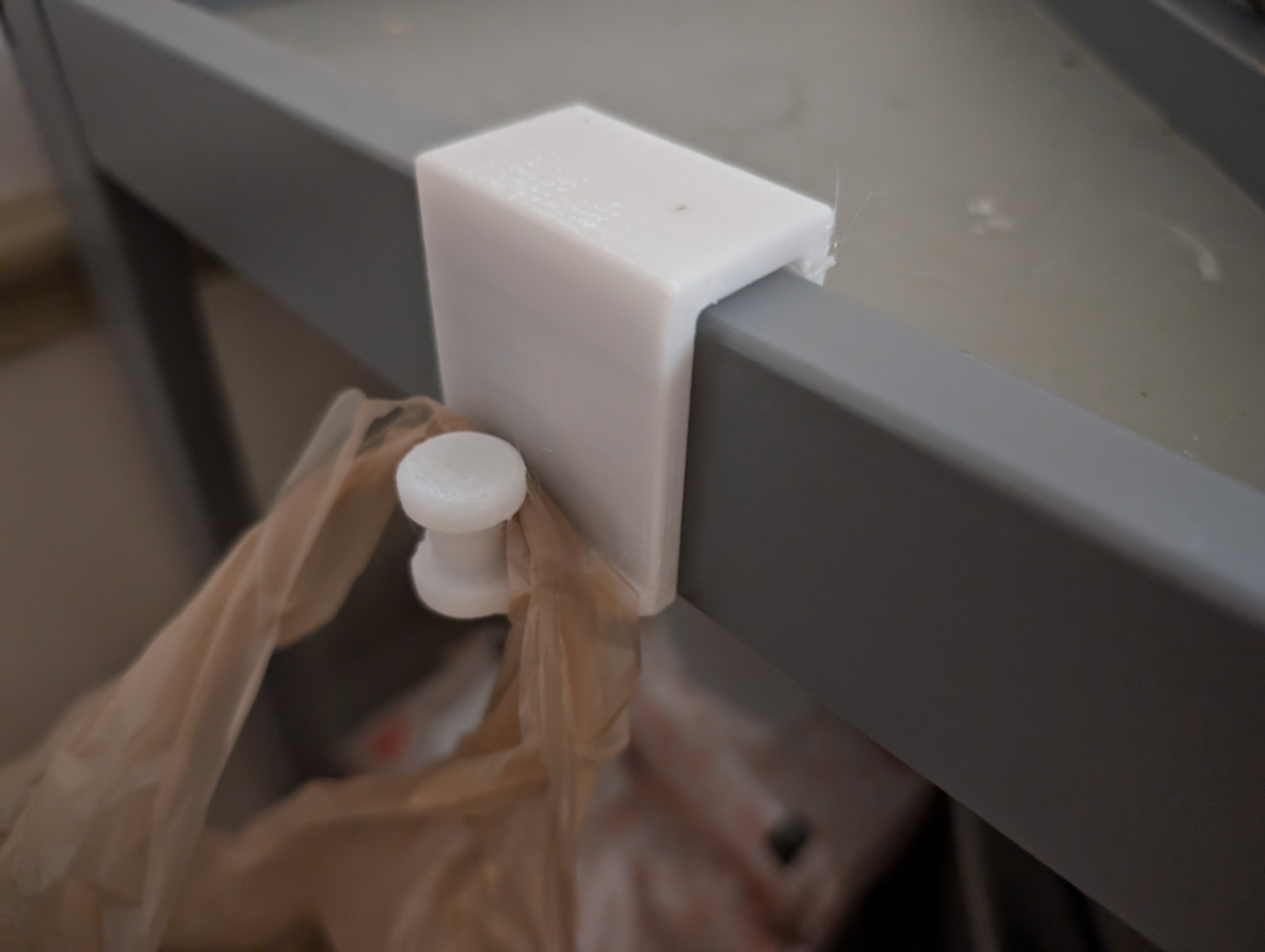 Plastic Grocery Bag Hook for Changing Table