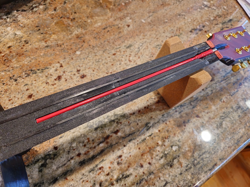 Updated fingerboard and accent plates for customized top color