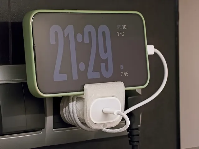 Wall outlet phone charging dock